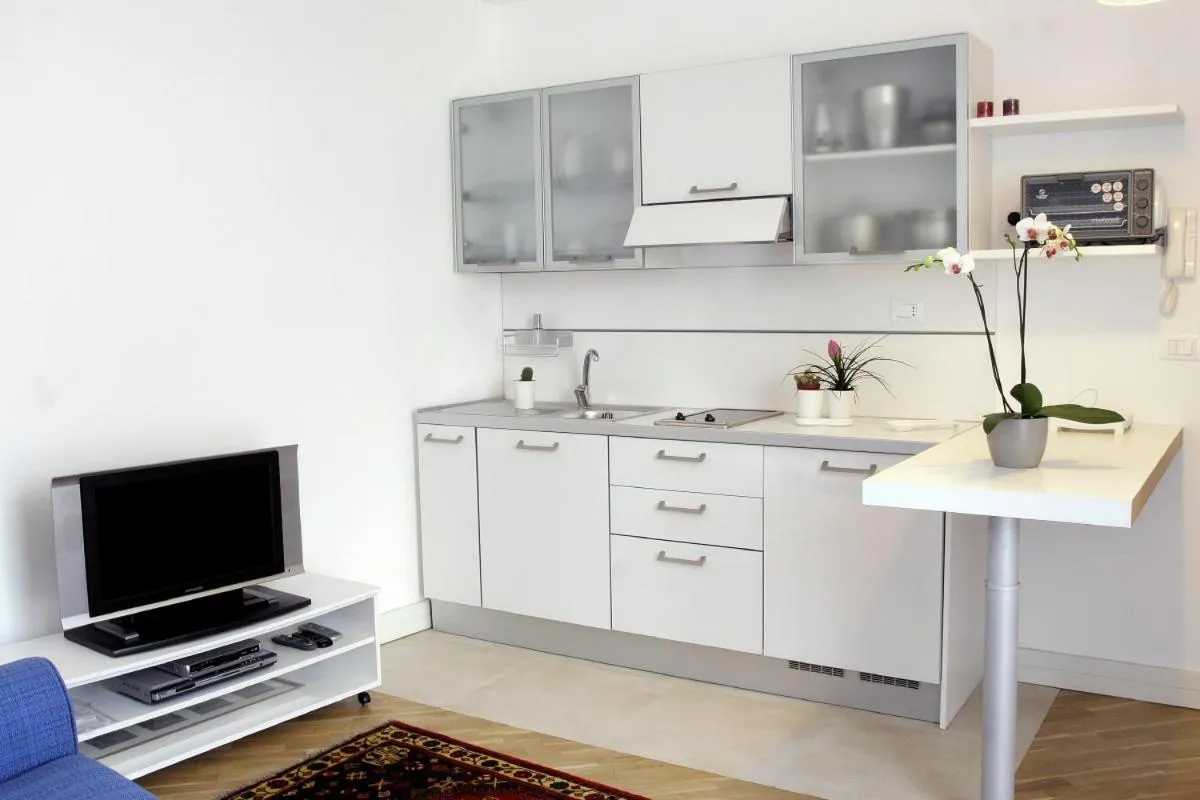 Kitchen or kitchenette in Ognina Residence