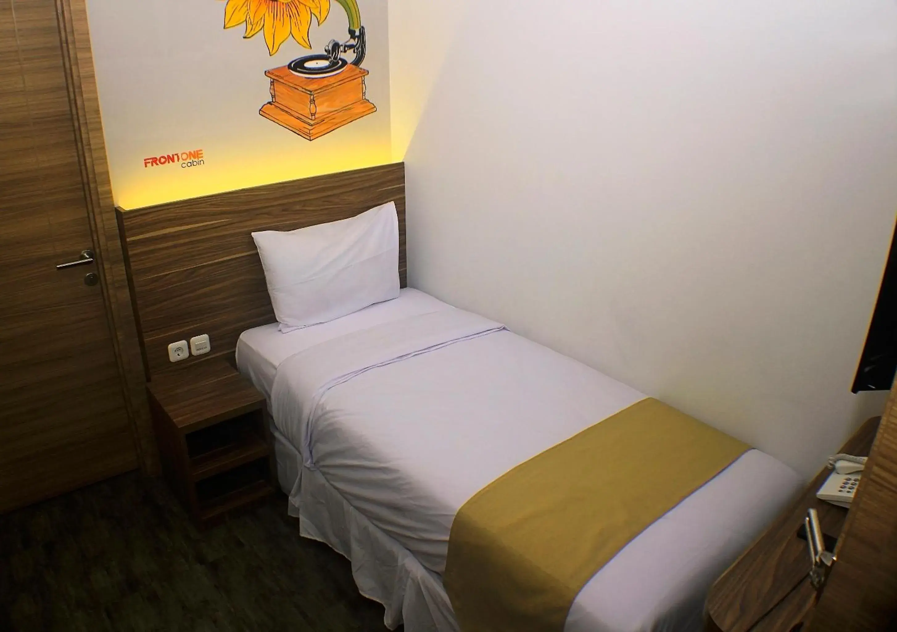 Bed in Front One Cabin Malioboro Jogja Bed in Front One Cabin Malioboro Jogja