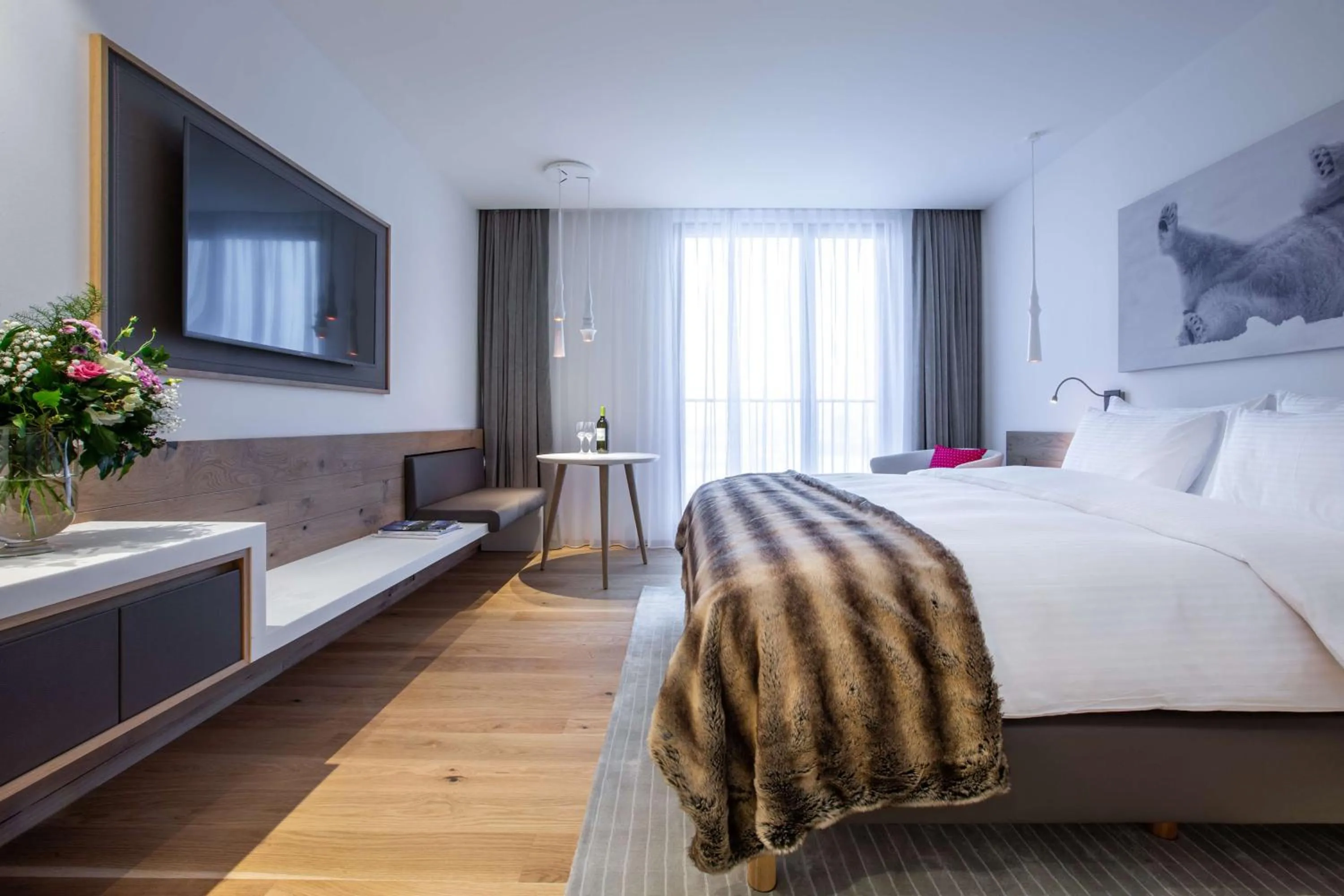 Photo of the whole room, Bed in Radisson Blu Hotel Reussen, Andermatt