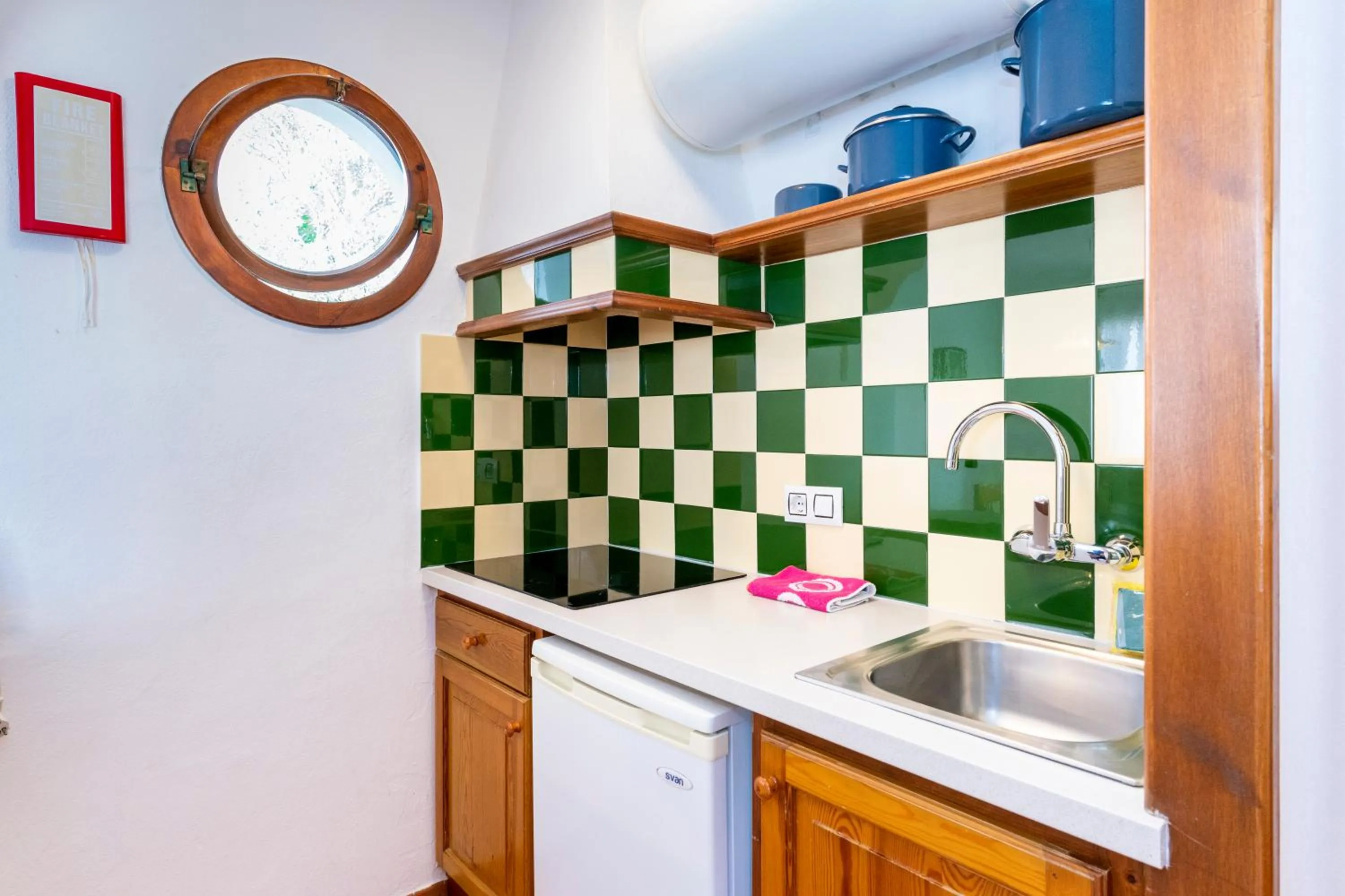 Kitchen or kitchenette in Apartamentos Vistapicas