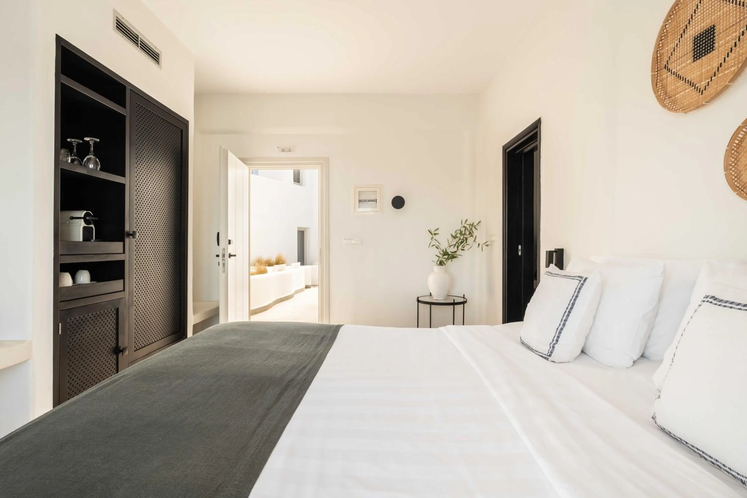 Bed in Rocabella Santorini Hotel & Spa