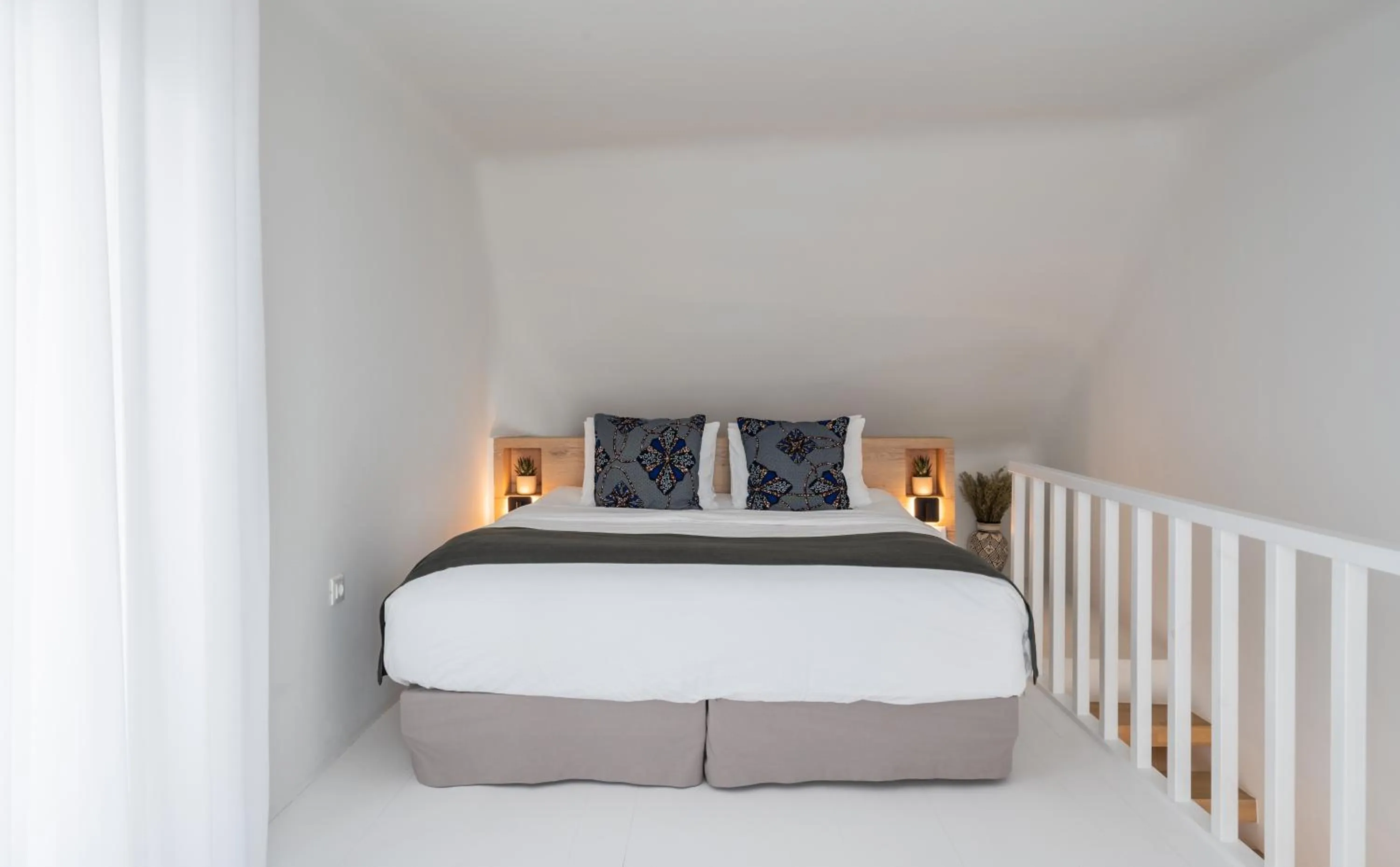 Bed in Rocabella Santorini Hotel & Spa