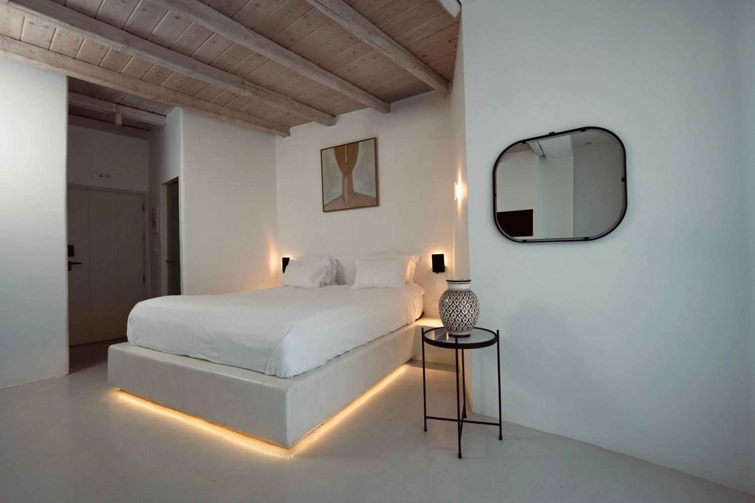 Bed in Rocabella Santorini Hotel & Spa