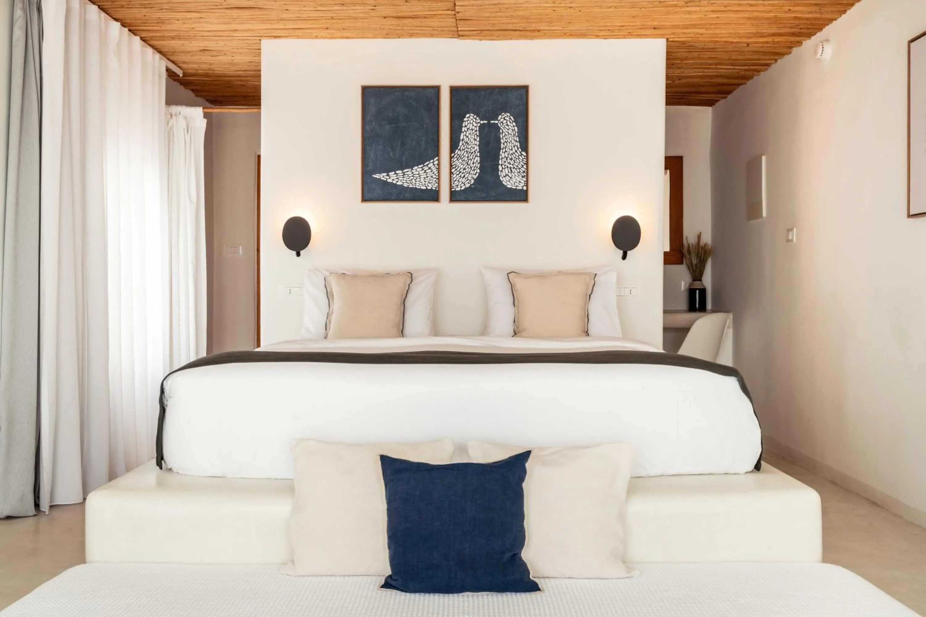 Bed in Rocabella Santorini Hotel & Spa