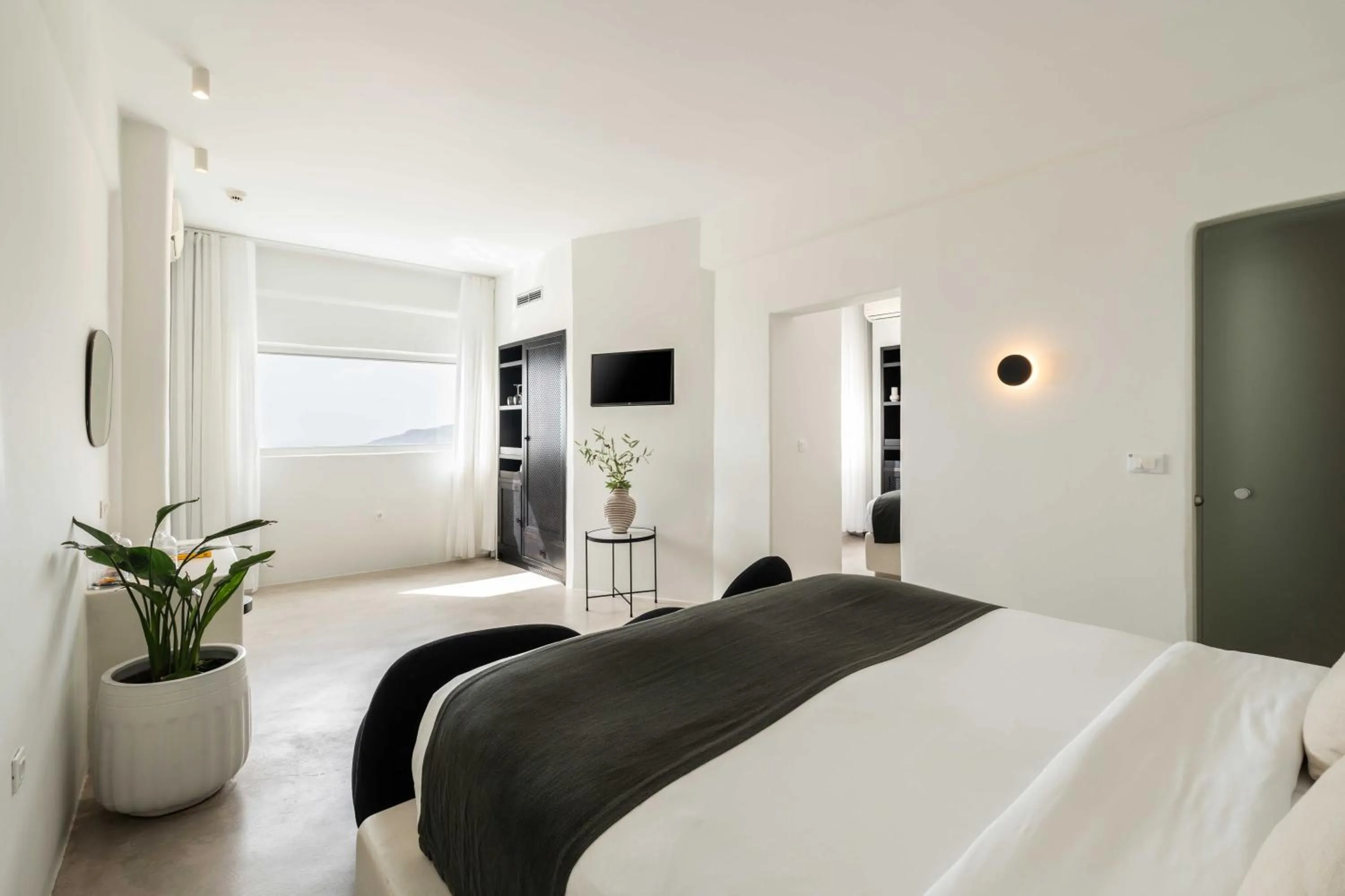 Bed in Rocabella Santorini Hotel & Spa