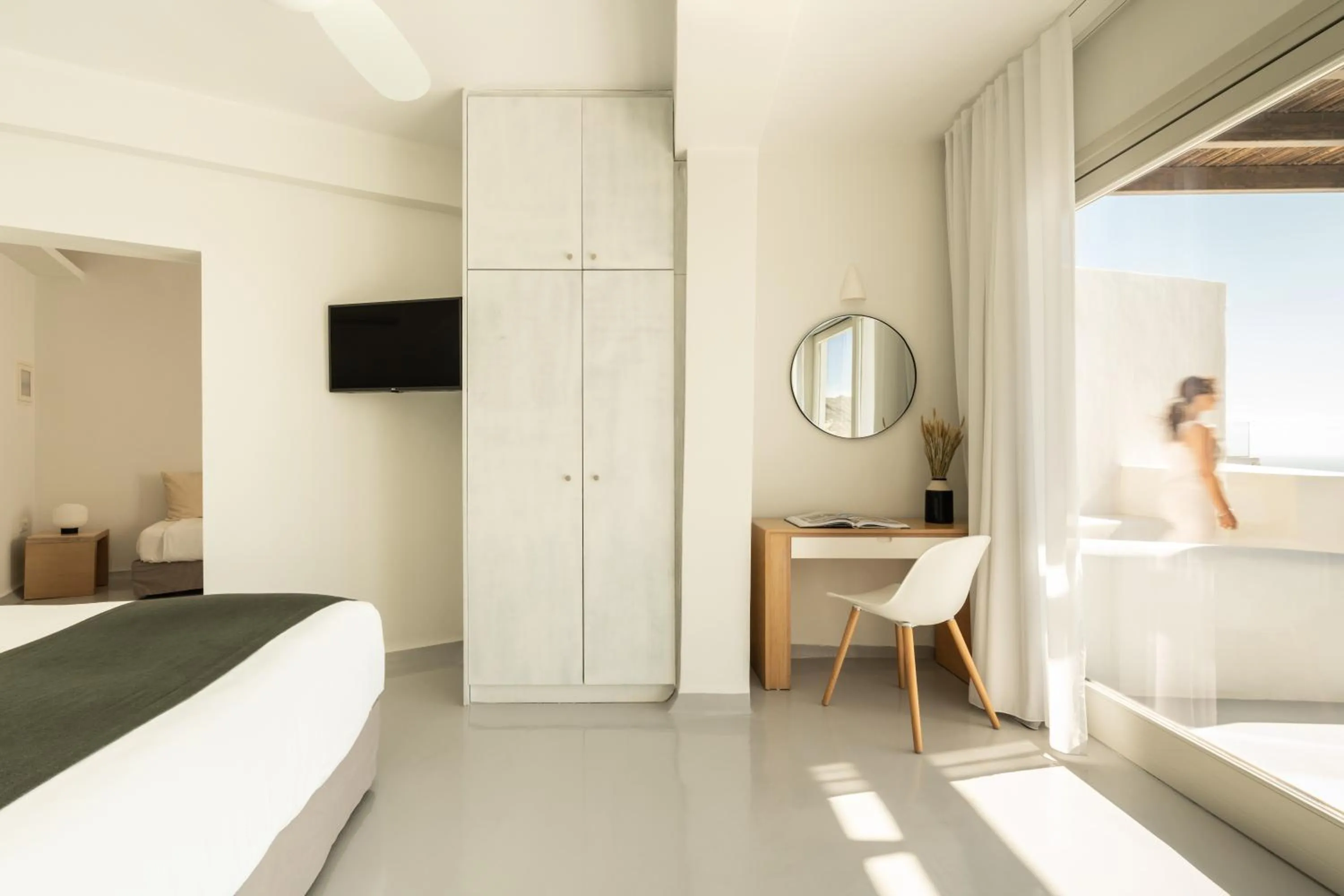 Bed in Rocabella Santorini Hotel & Spa