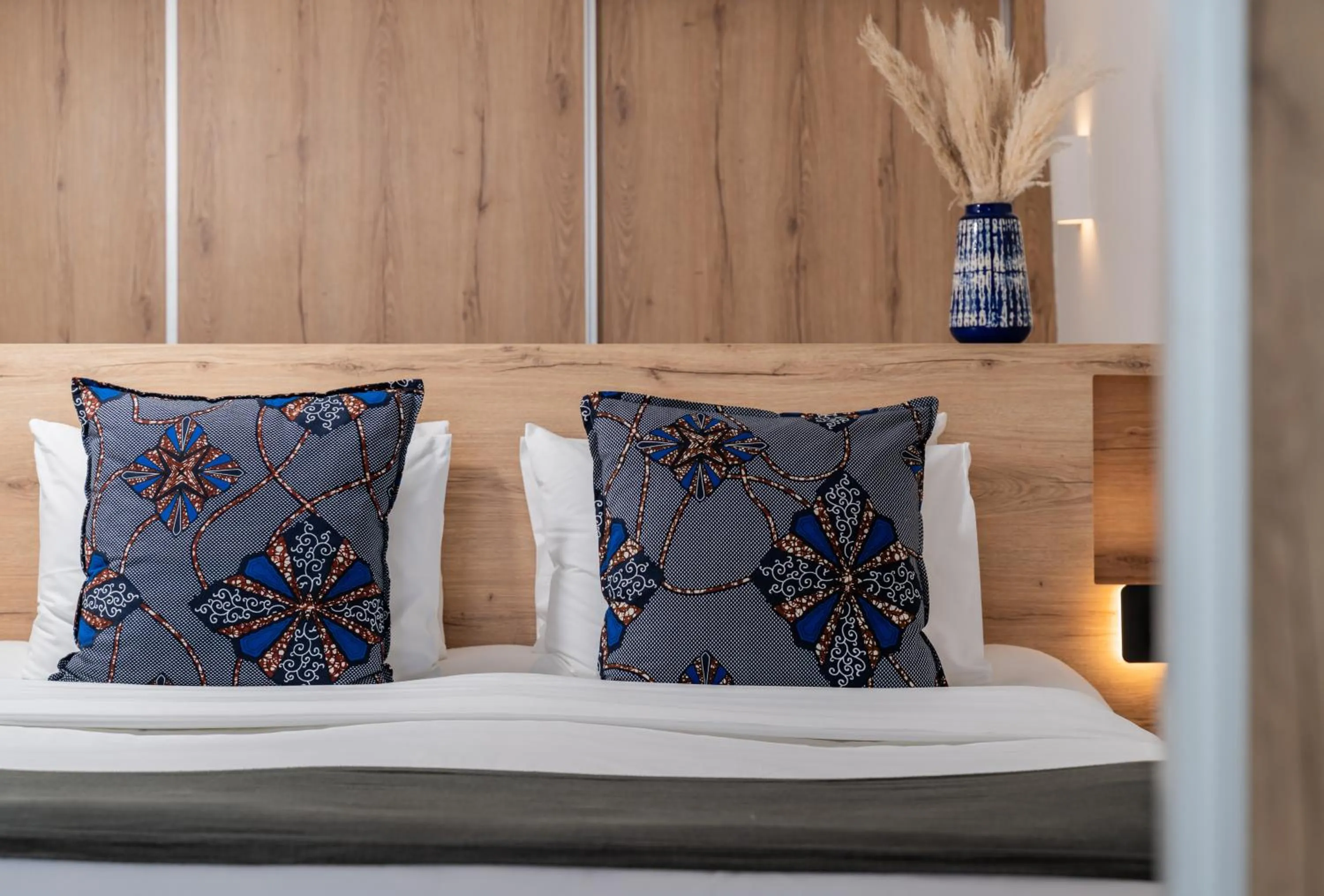 Bed in Rocabella Santorini Hotel & Spa