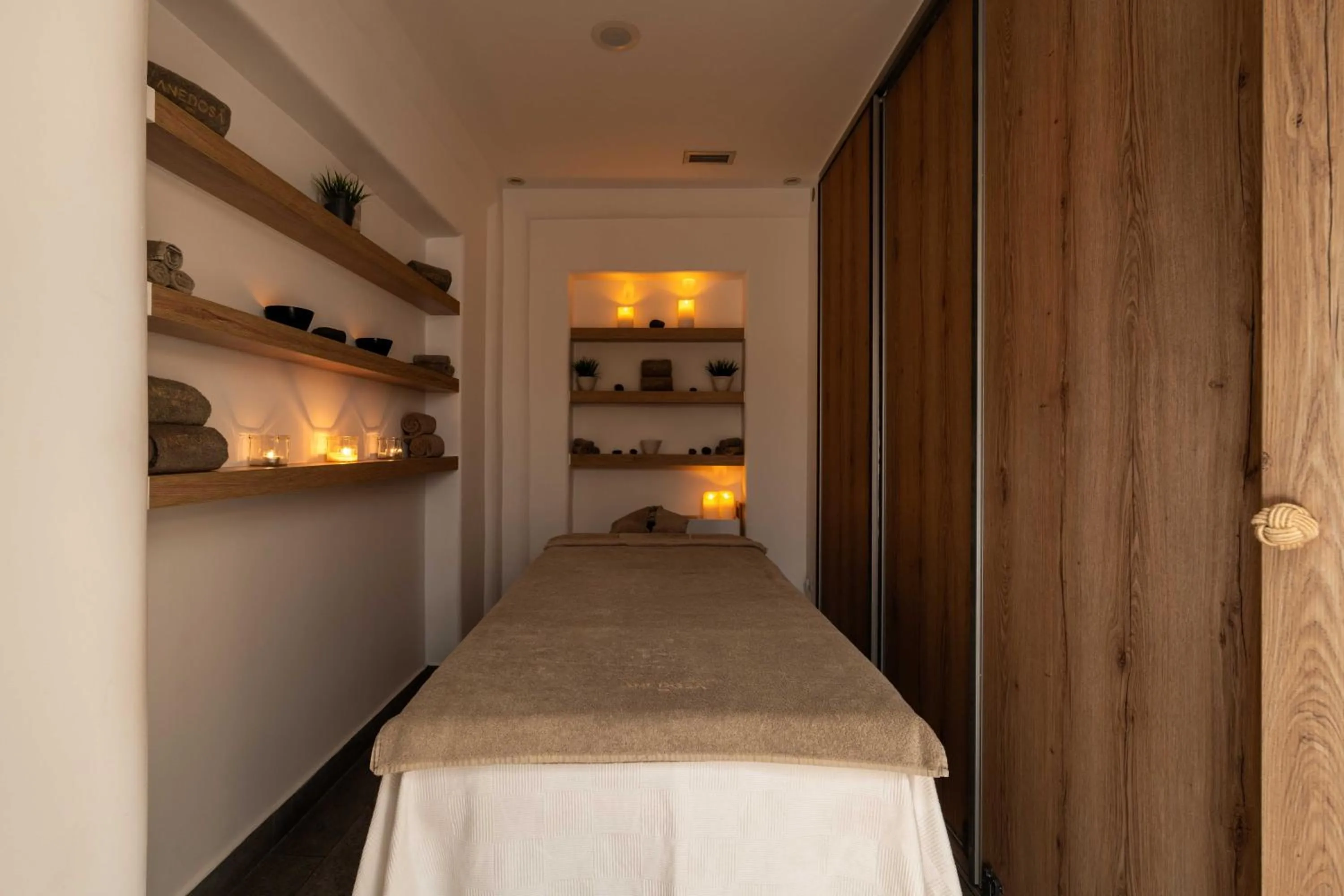 Bed in Rocabella Santorini Hotel & Spa