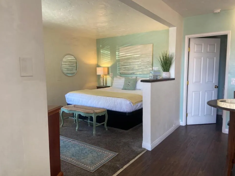 Bed in The Patriots Boutique Motel