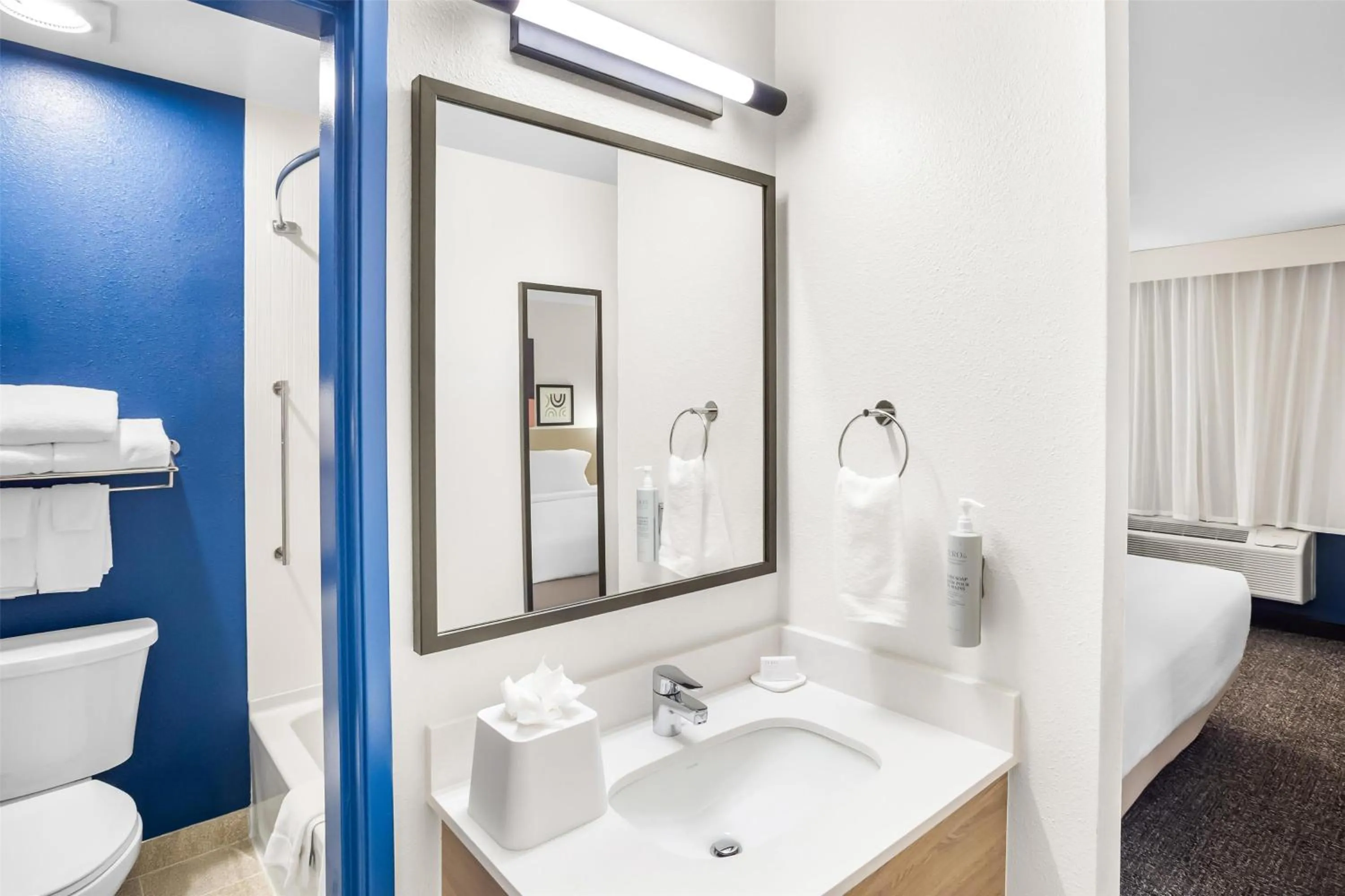 Bathroom in Spark by Hilton Kent Seattle