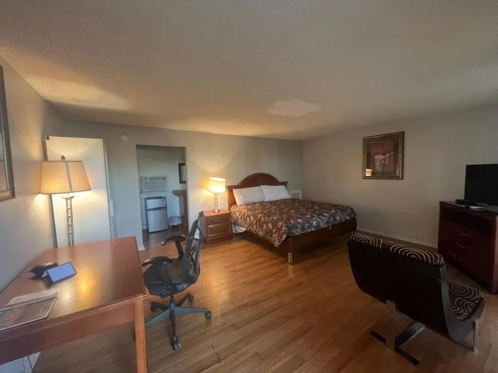 Bed in ANS INN & SUITES