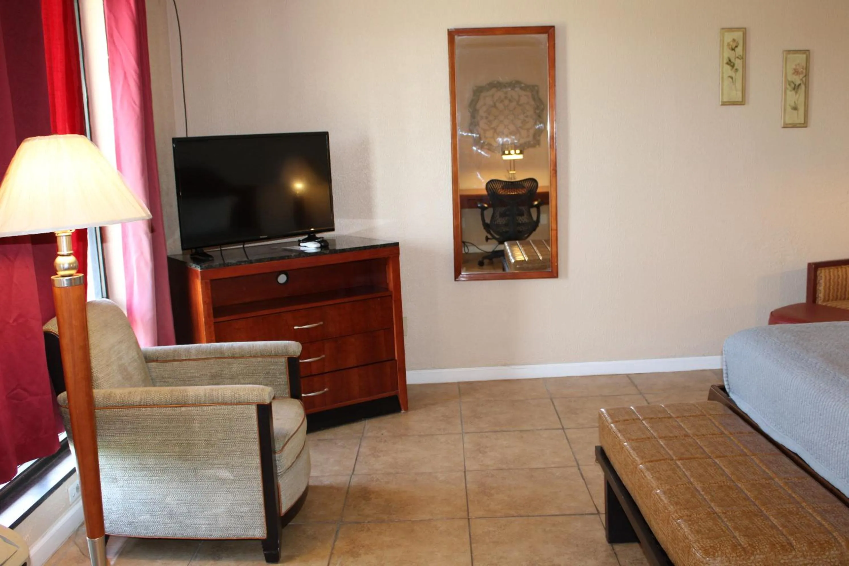 Bed in ANS INN & SUITES