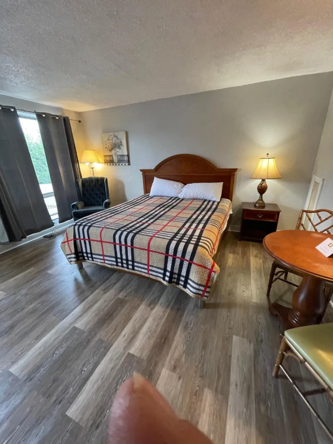 Bed in ANS INN & SUITES