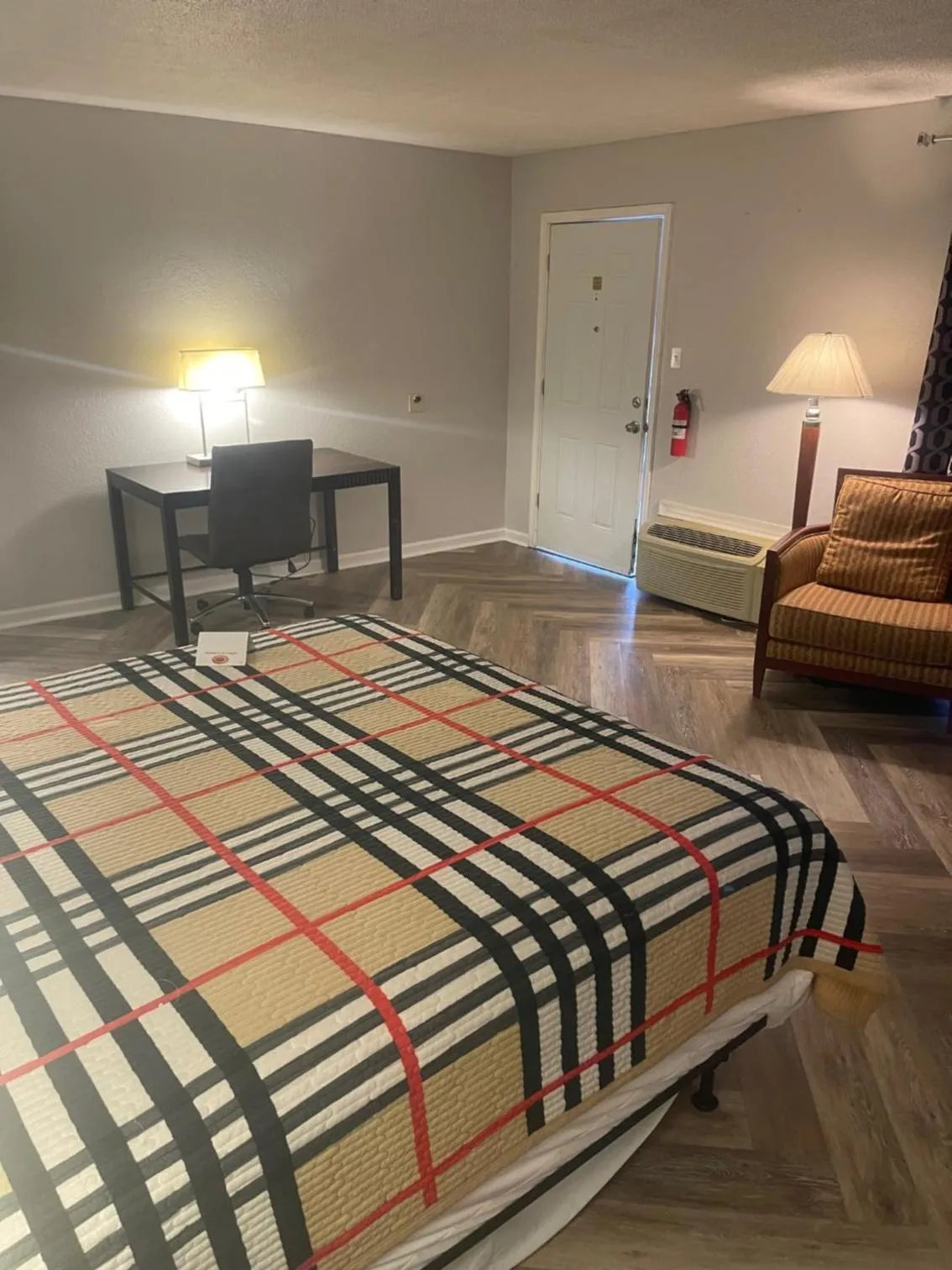 Bed in ANS INN & SUITES