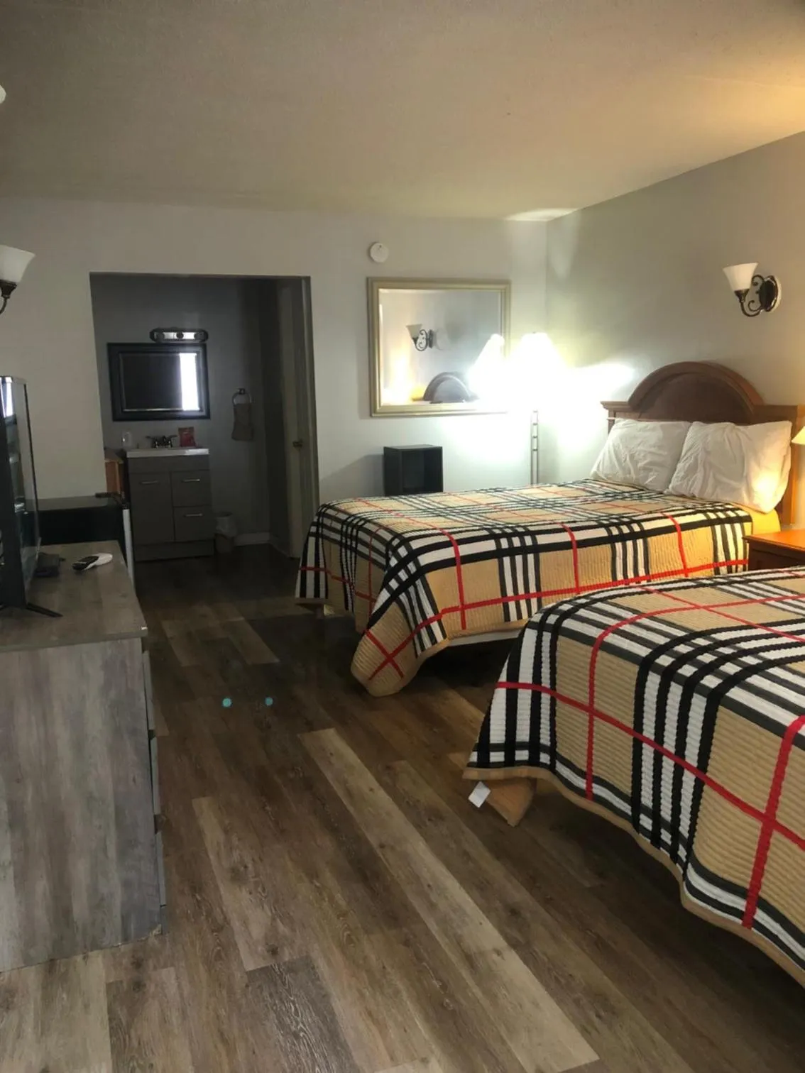 Bed in ANS INN & SUITES