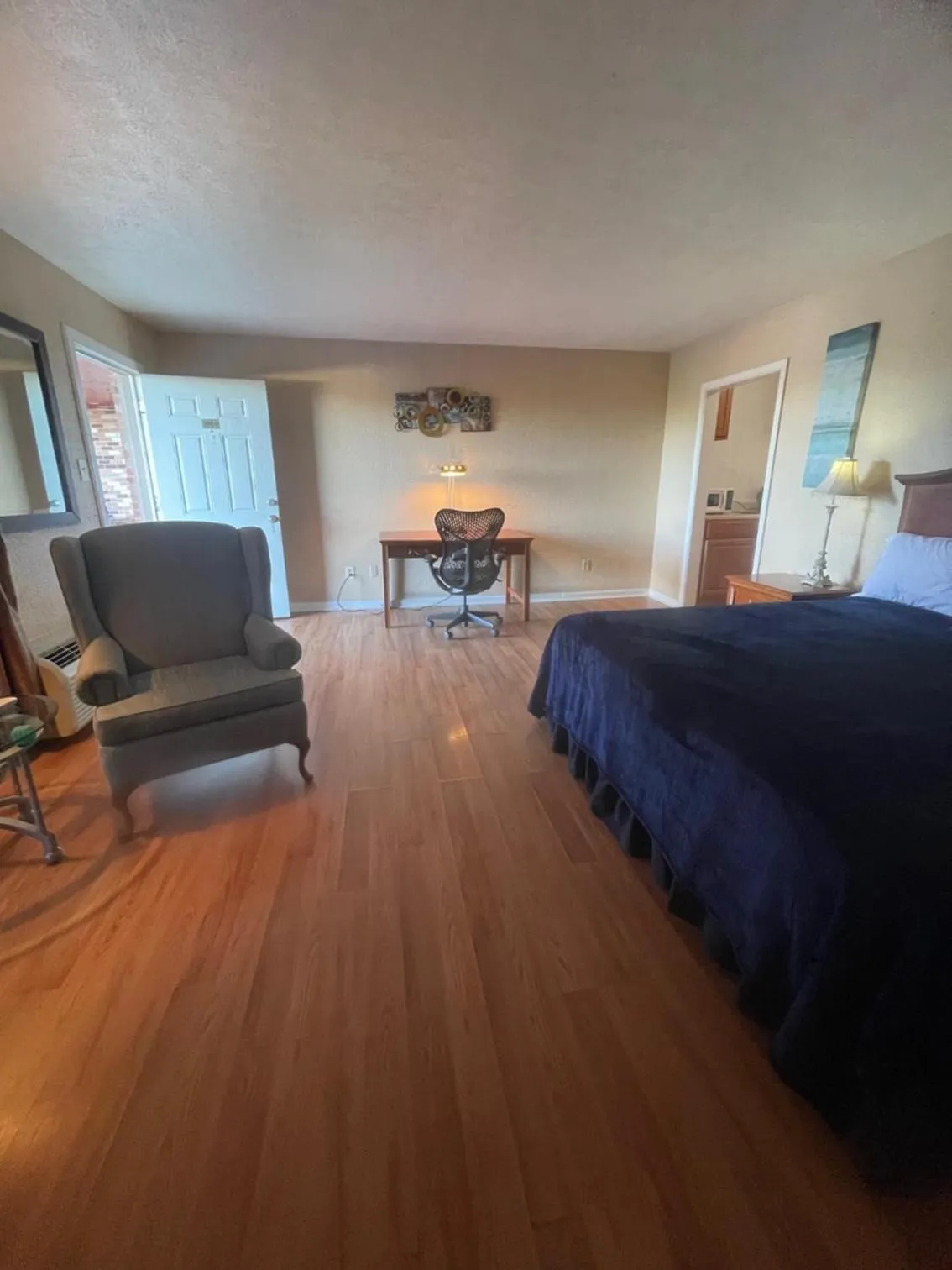 Bed in ANS INN & SUITES