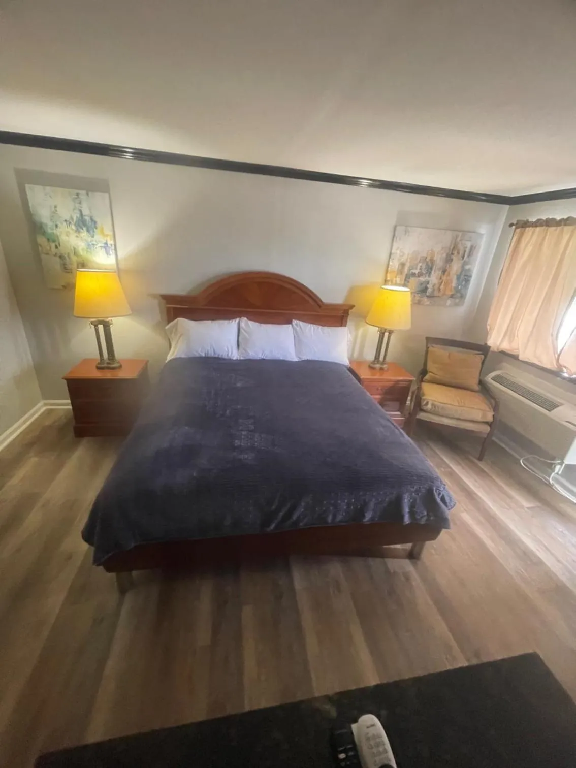 Bed in ANS INN & SUITES