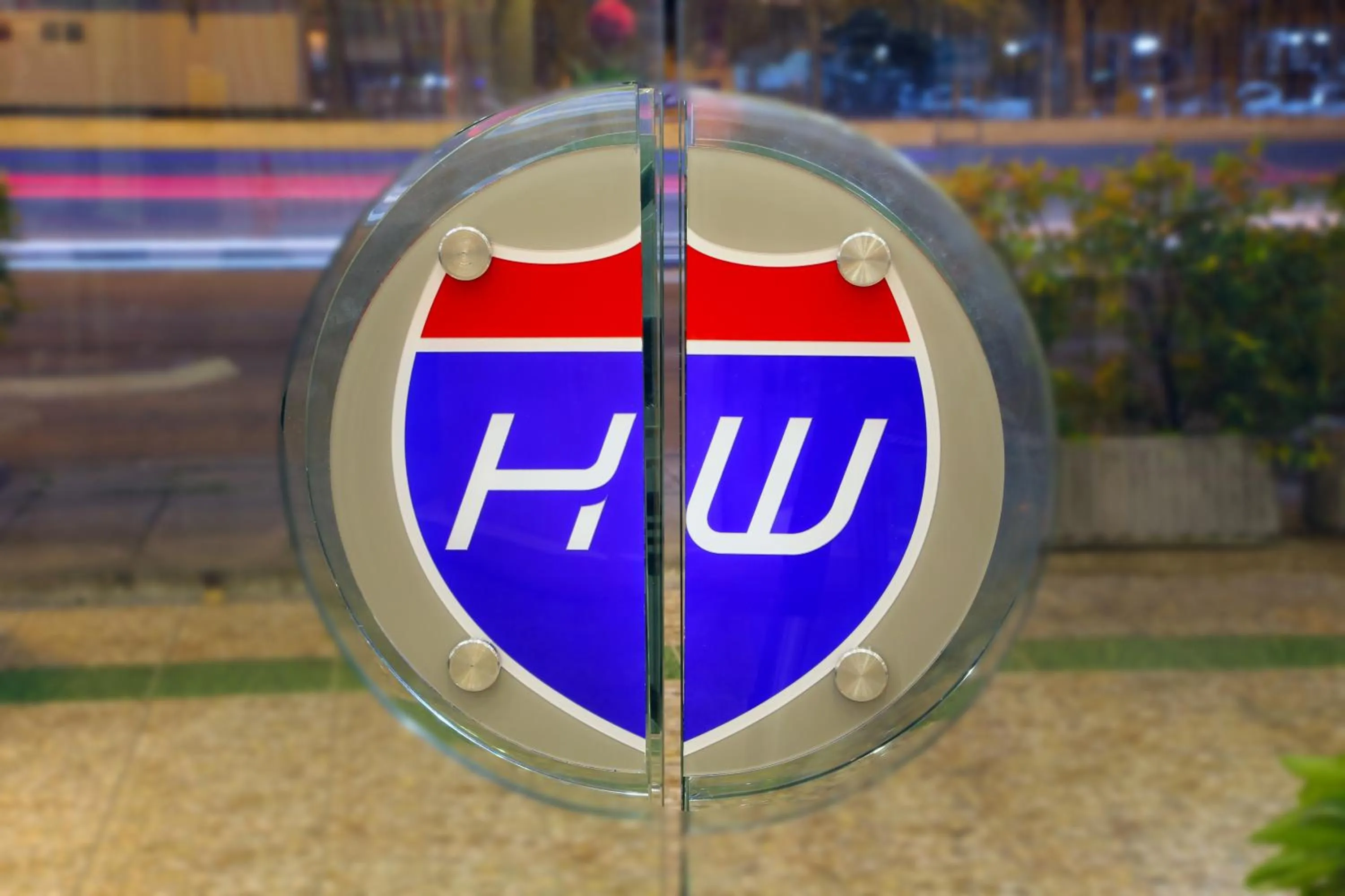 Property logo or sign in Highway Hotel