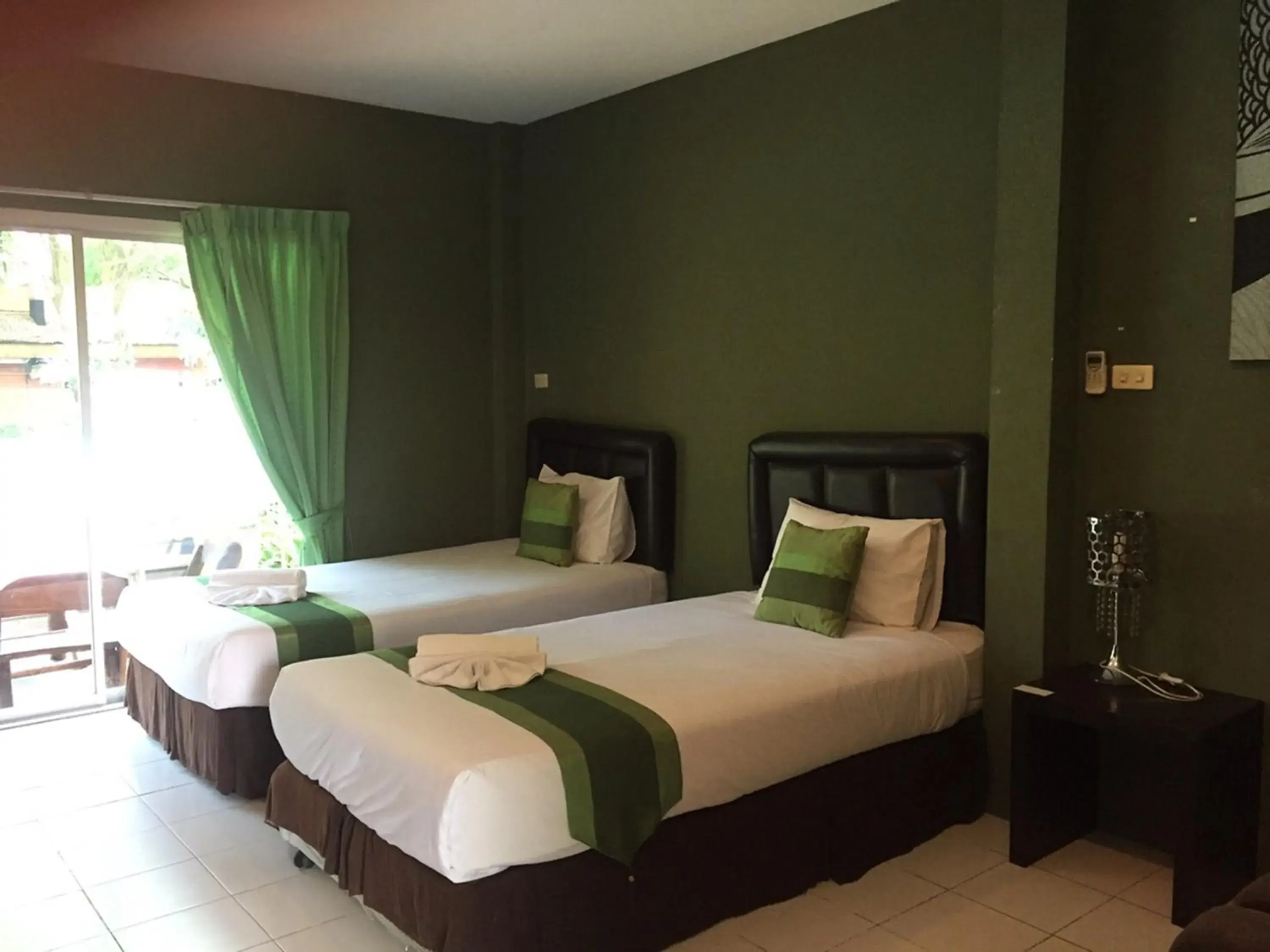 Bed in Aurora Resort Kanchanaburi Bed in Aurora Resort Kanchanaburi