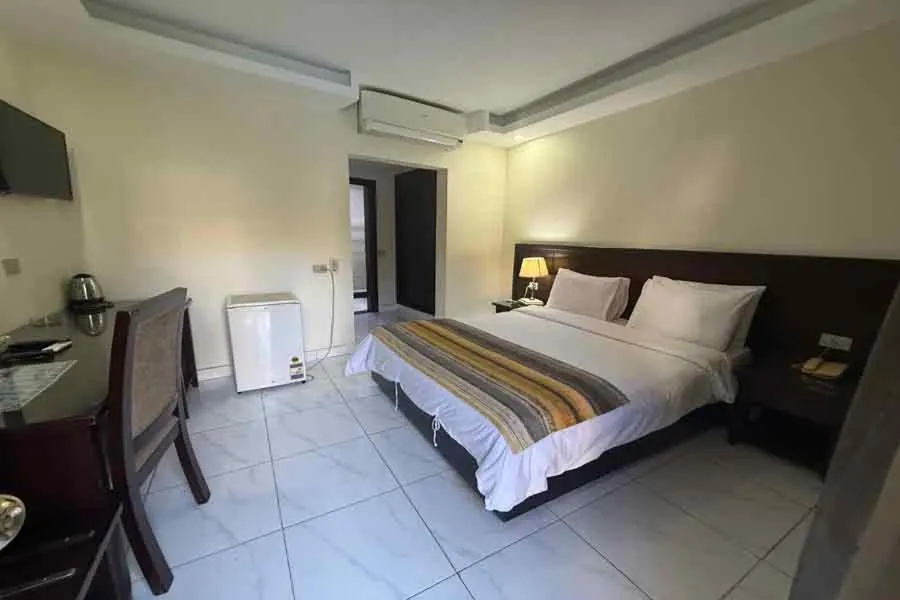 Bed in Naama Inn Hotel