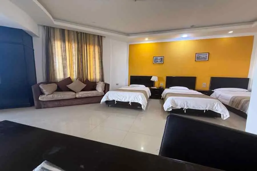 Bed in Naama Inn Hotel