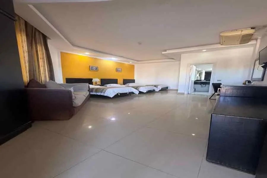 Bed in Naama Inn Hotel