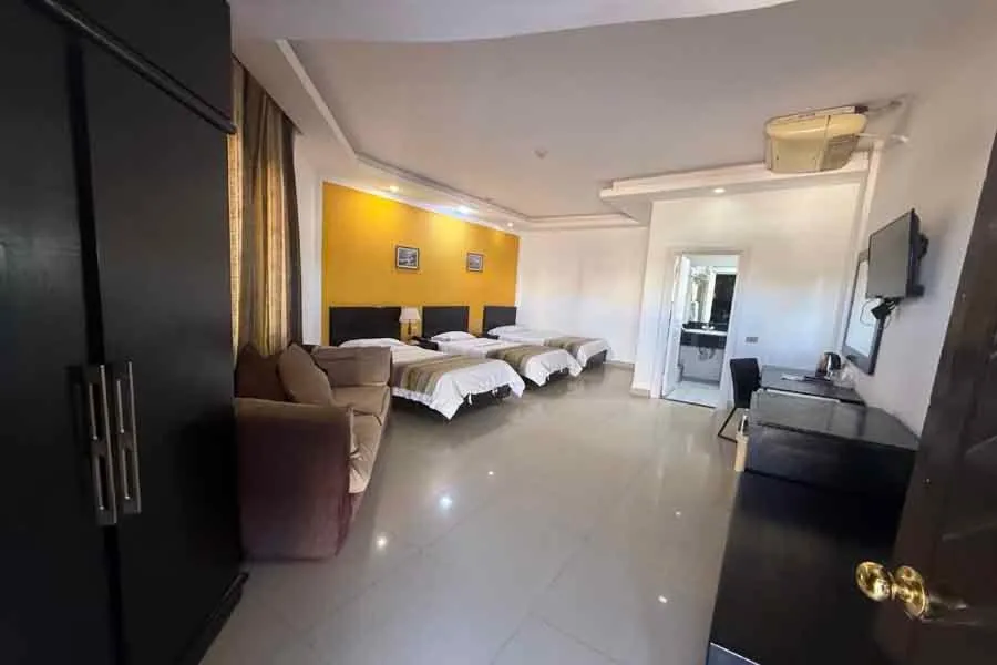 Bed in Naama Inn Hotel