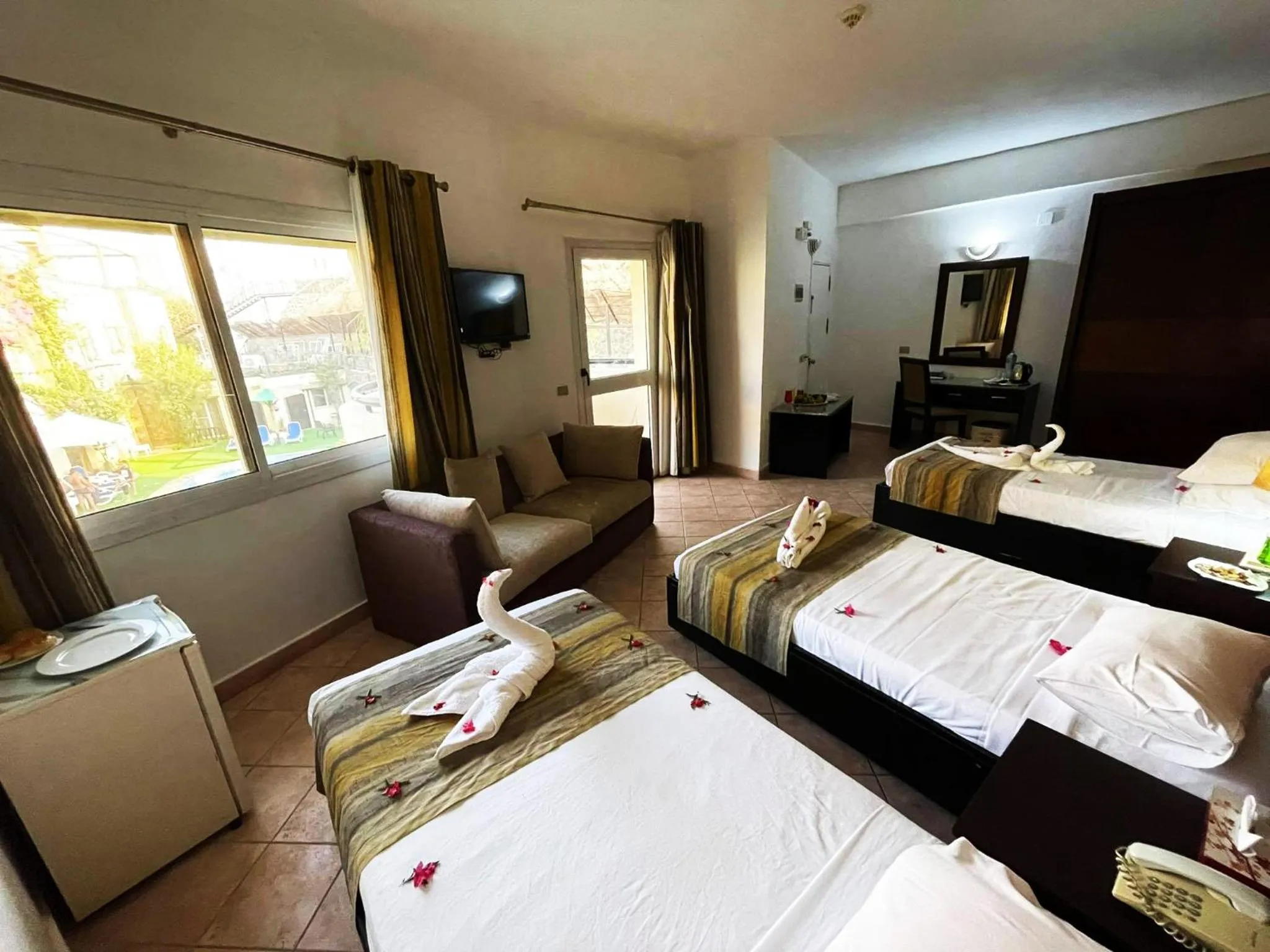 Bed in Naama Inn Hotel