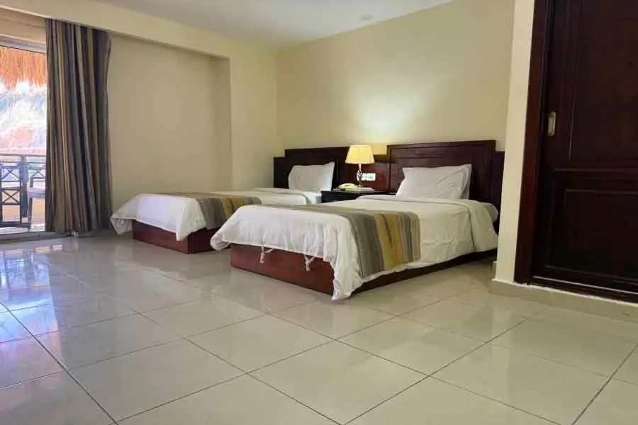 Bed in Naama Inn Hotel