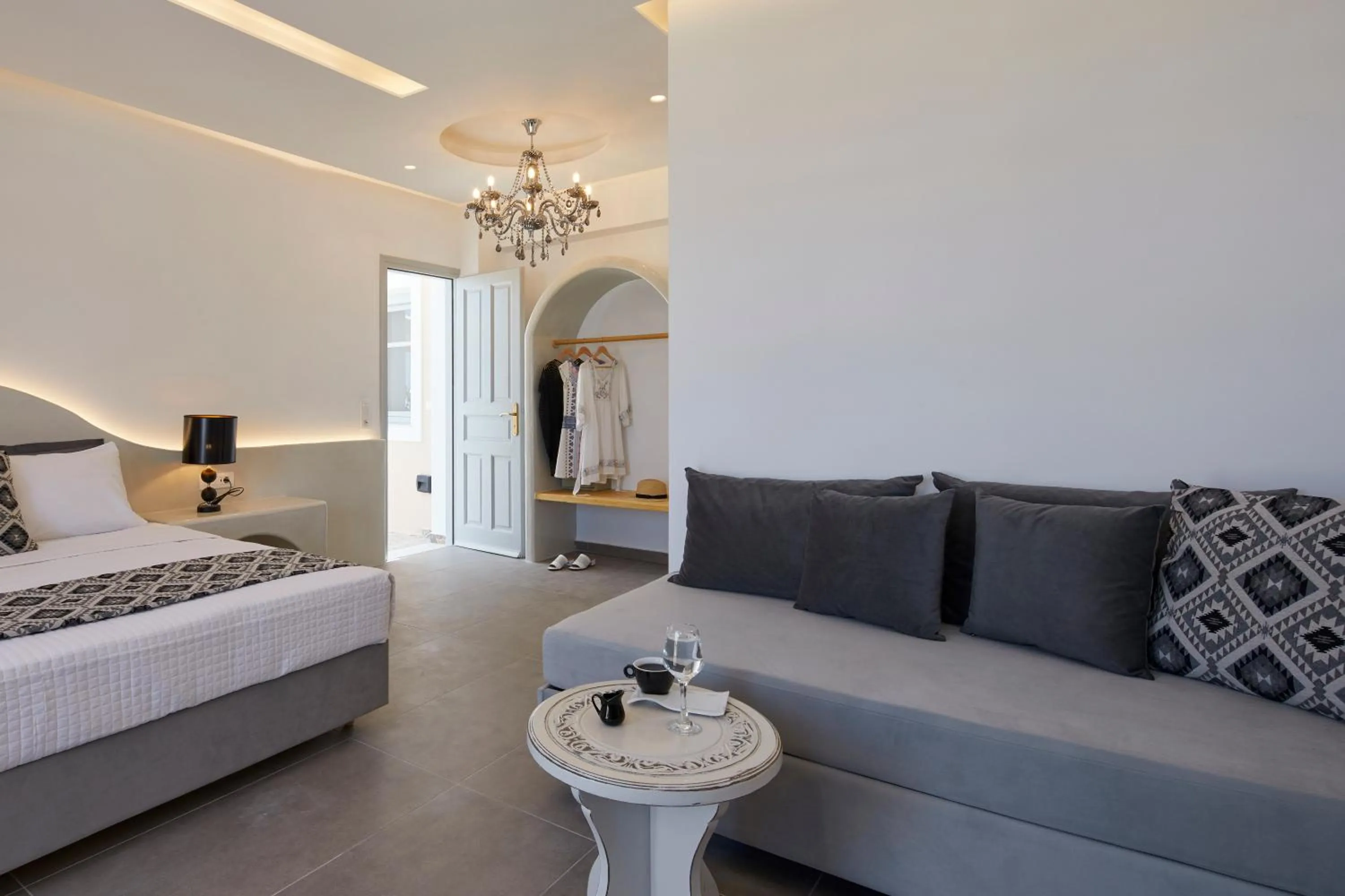 Seating area, Bed in Blue Sea Hotel