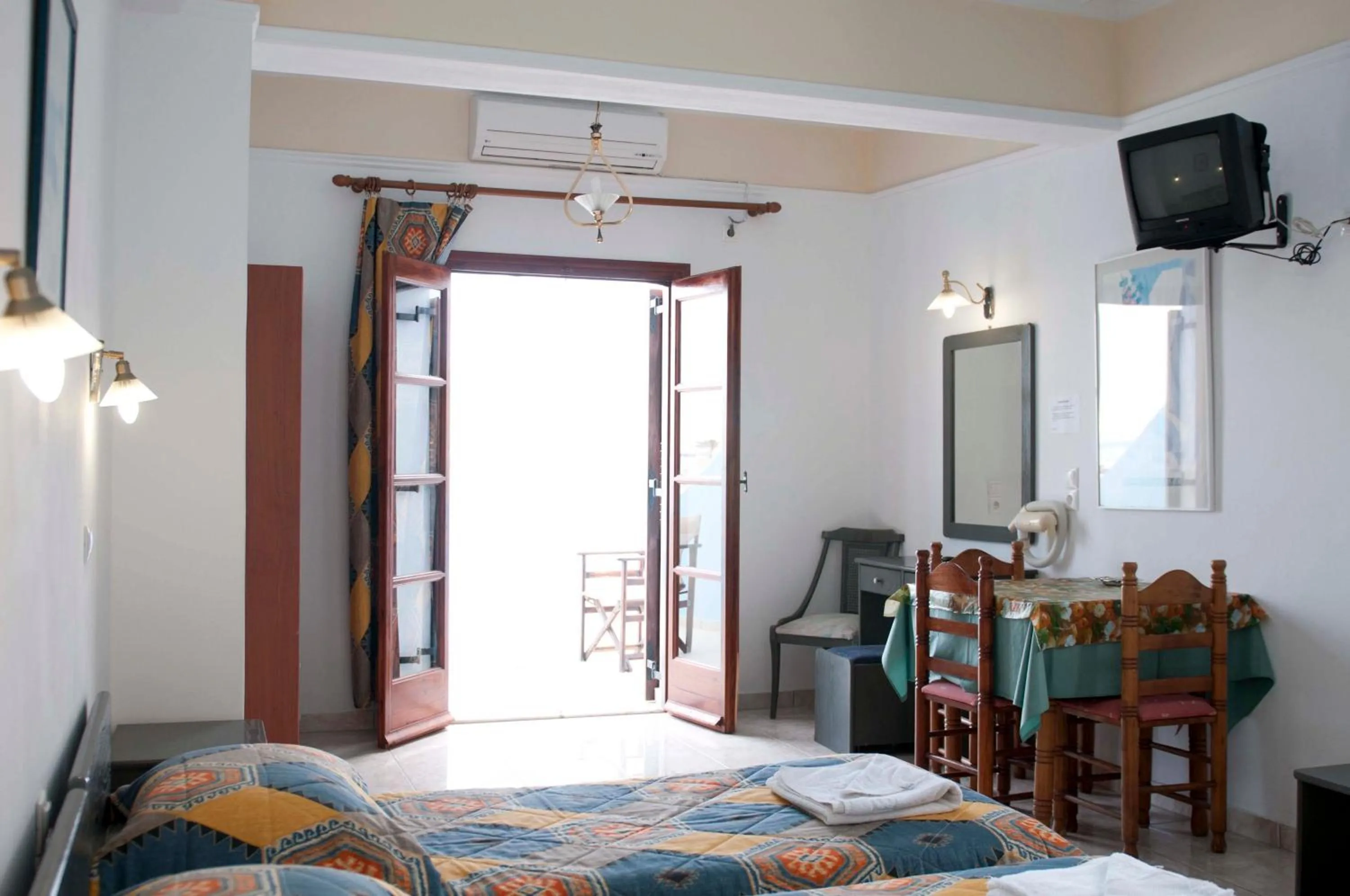 Photo of the whole room, Bed in Blue Sea Hotel