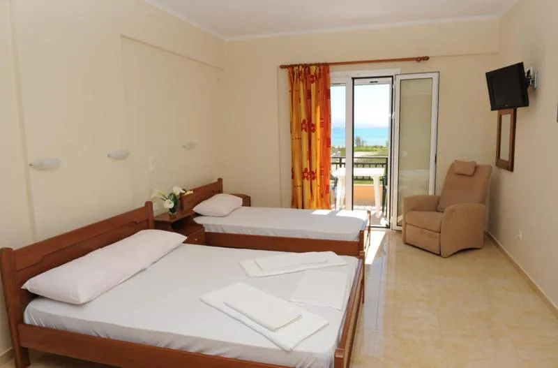 Bed in Calypso Luxury Studios