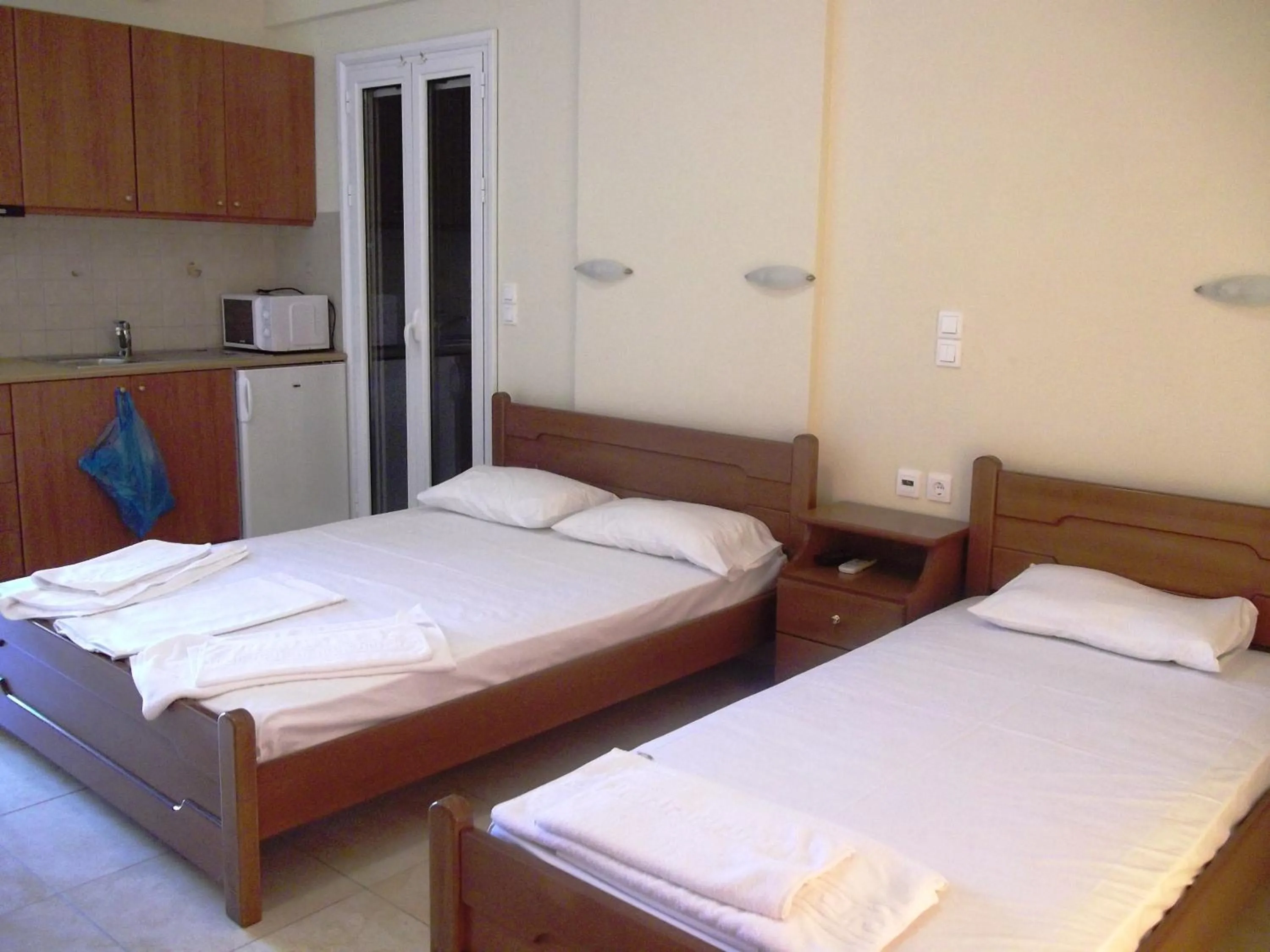 Bed in Calypso Luxury Studios