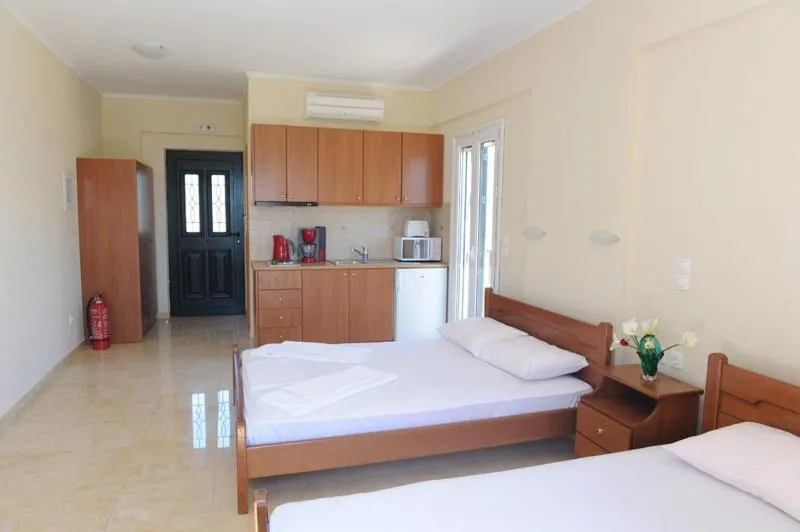 Bed in Calypso Luxury Studios