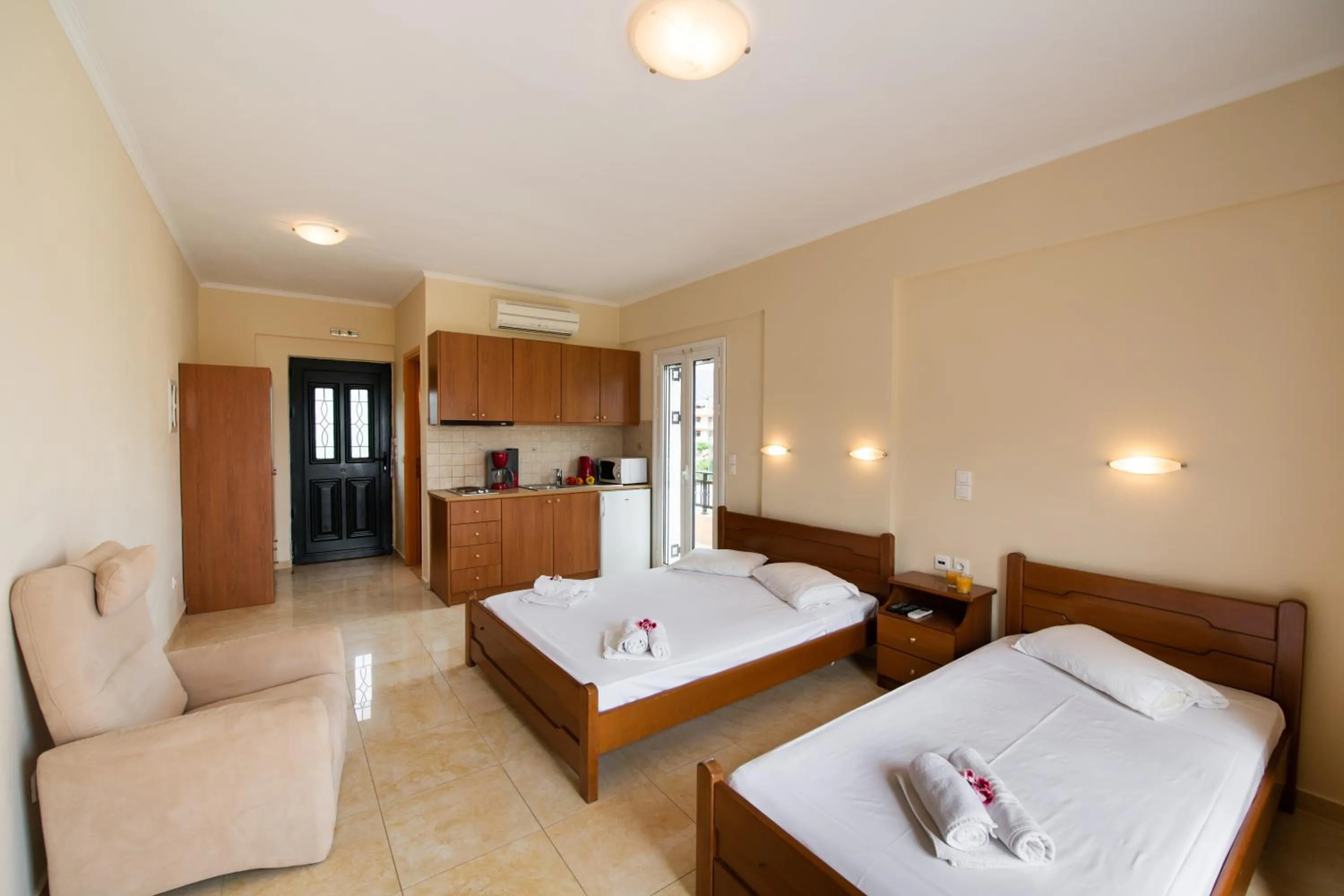 Bed in Calypso Luxury Studios