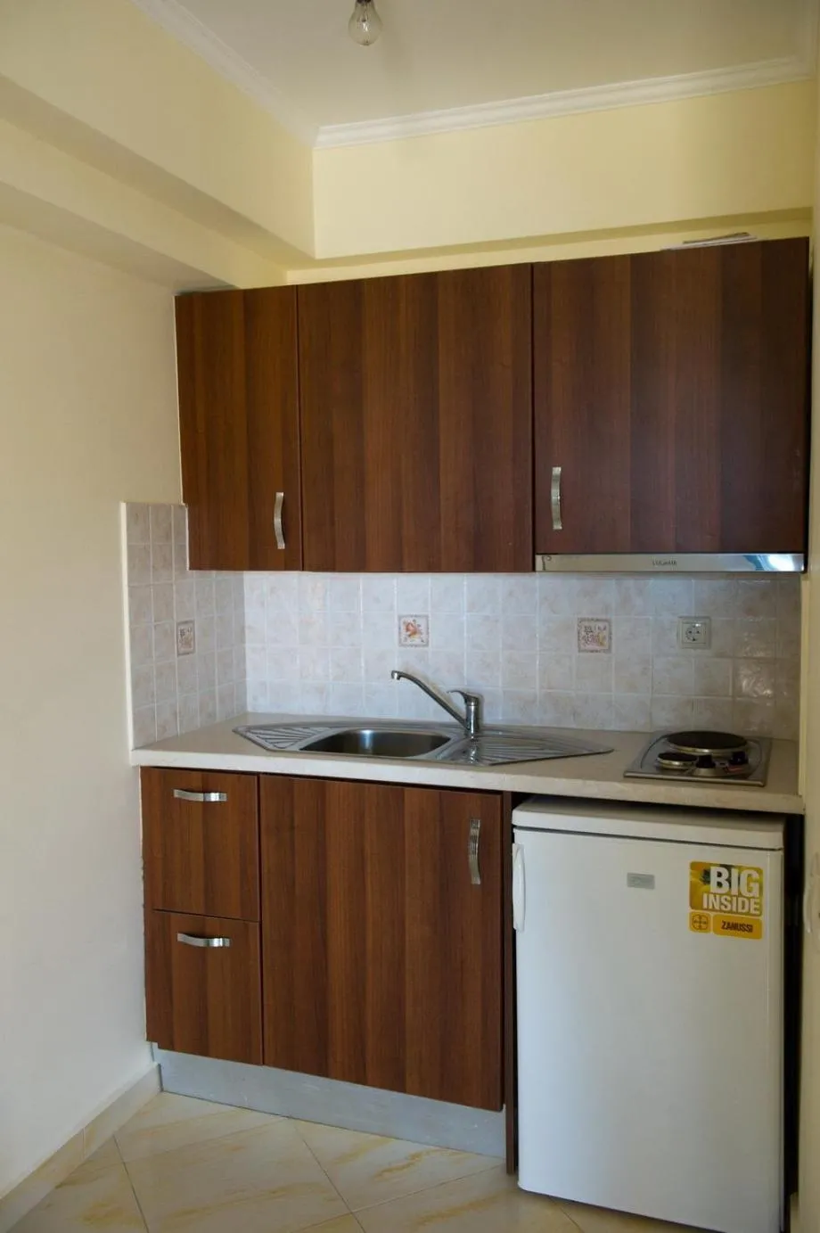Kitchen or kitchenette in Calypso Luxury Studios