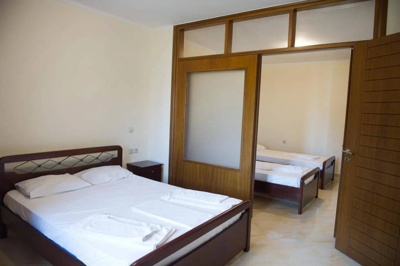 Bed in Calypso Luxury Studios