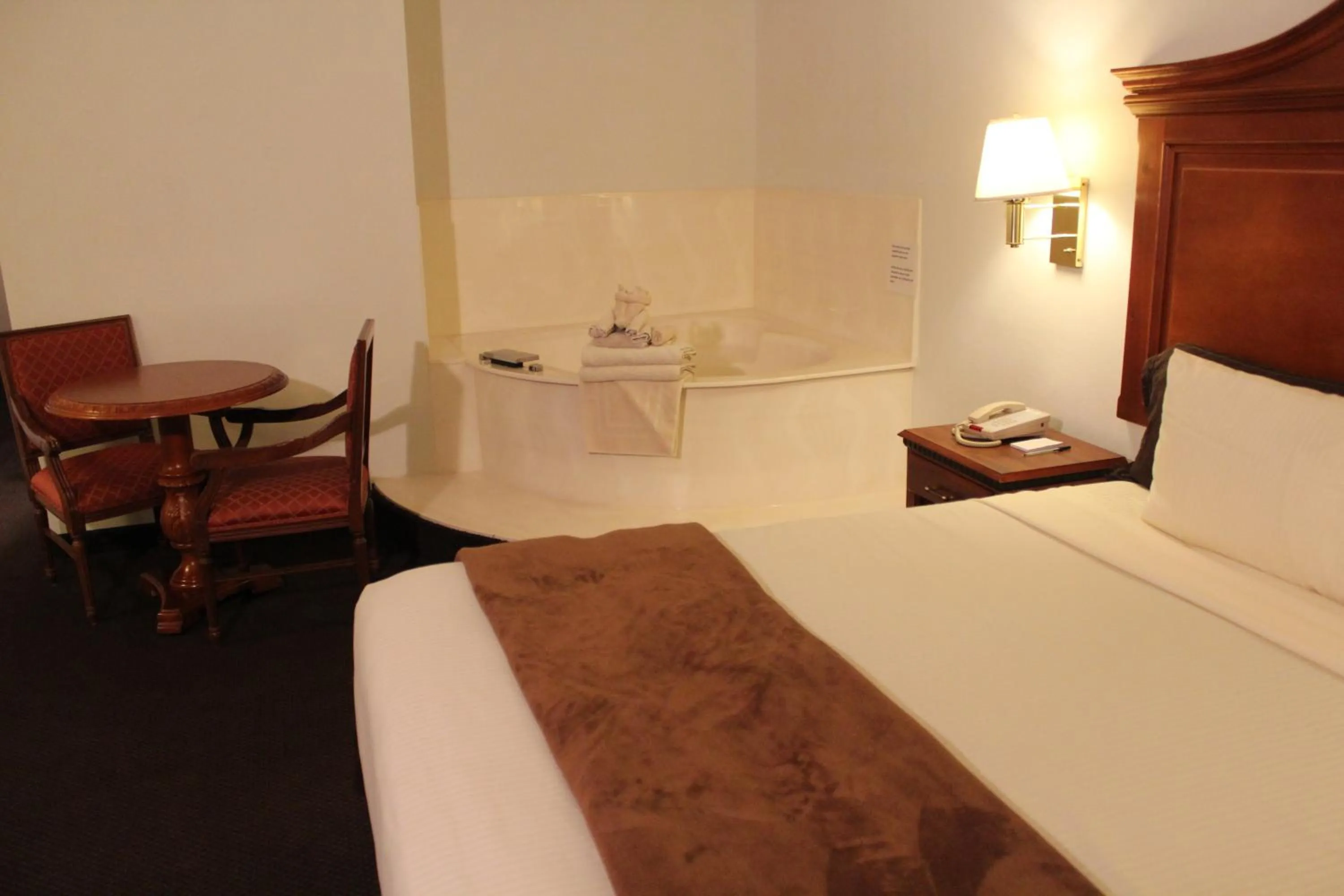 Bed in Dodge House Hotel