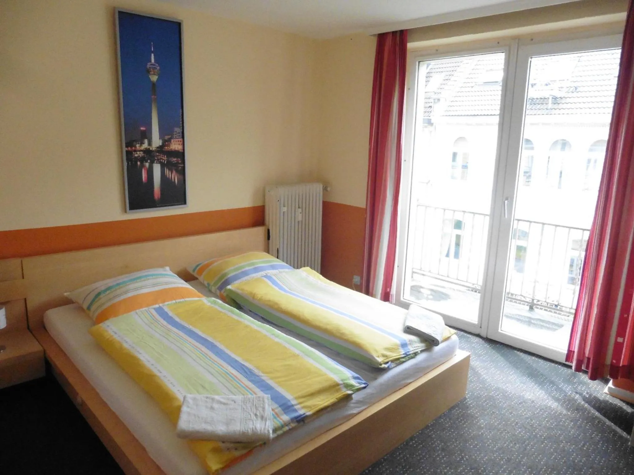 Photo of the whole room, Bed in Gästehaus Grupello