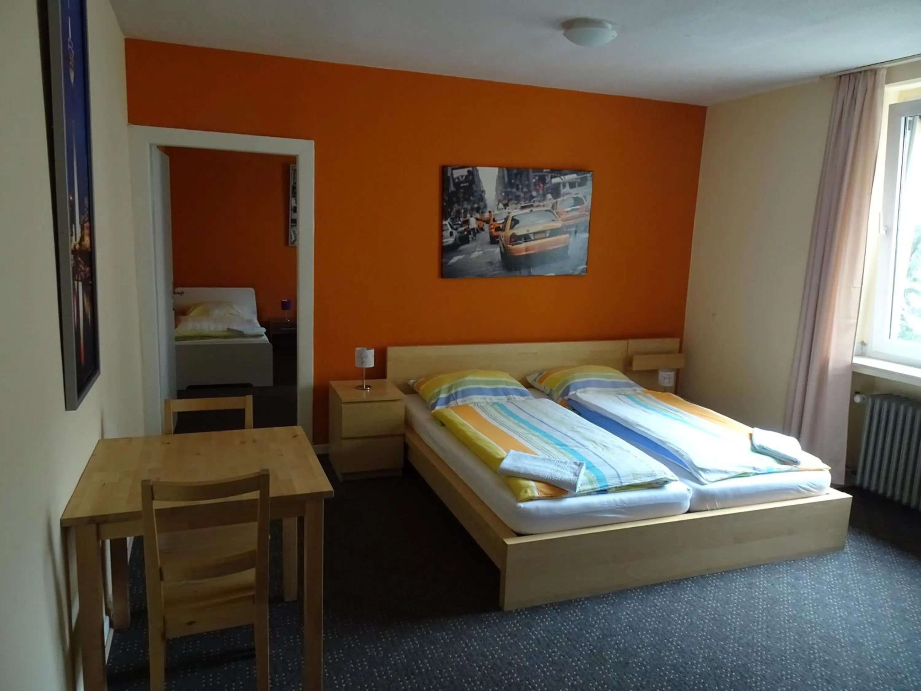 Photo of the whole room, Bed in Gästehaus Grupello