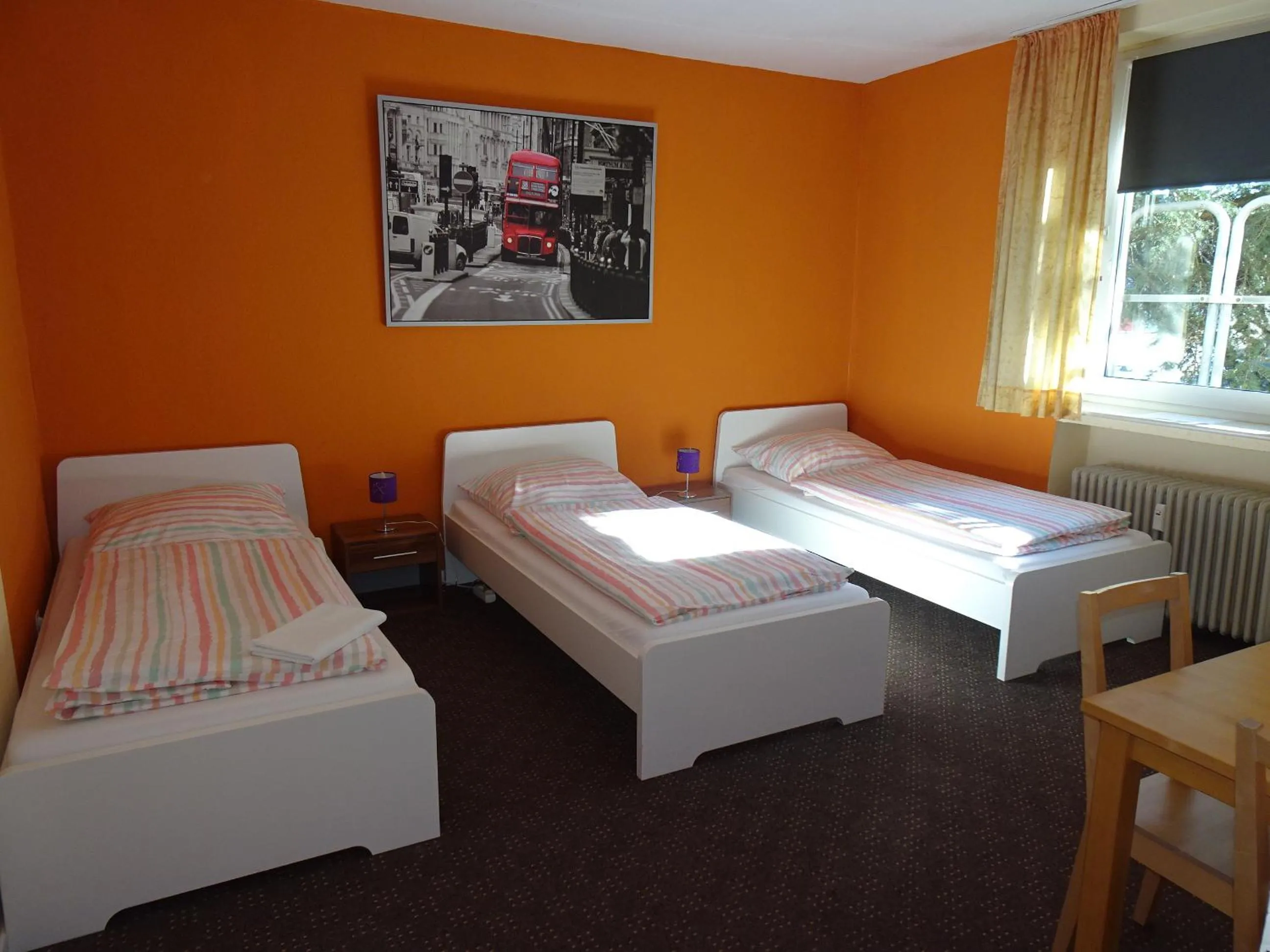 Photo of the whole room, Bed in Gästehaus Grupello