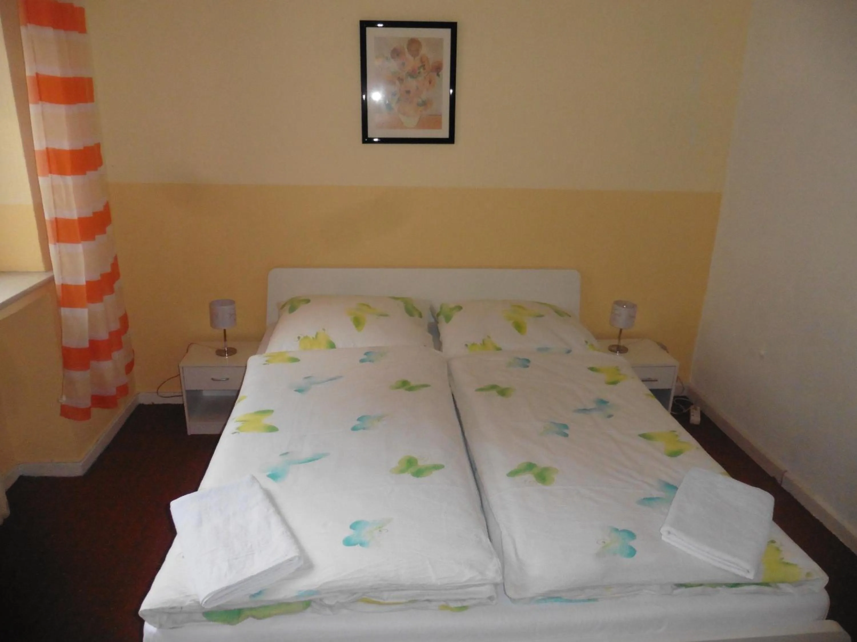 Photo of the whole room, Bed in Gästehaus Grupello