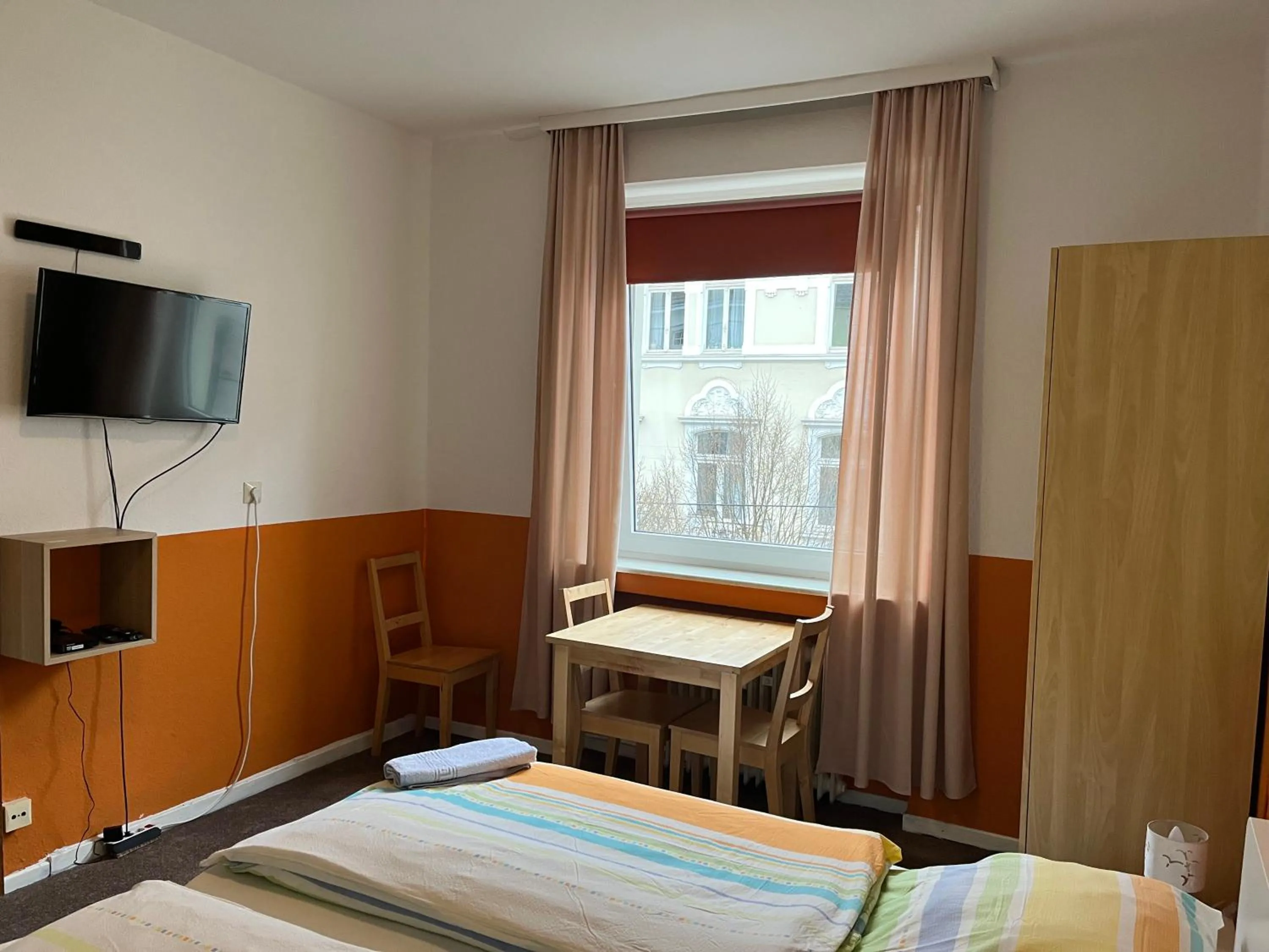 Photo of the whole room, Bed in Gästehaus Grupello