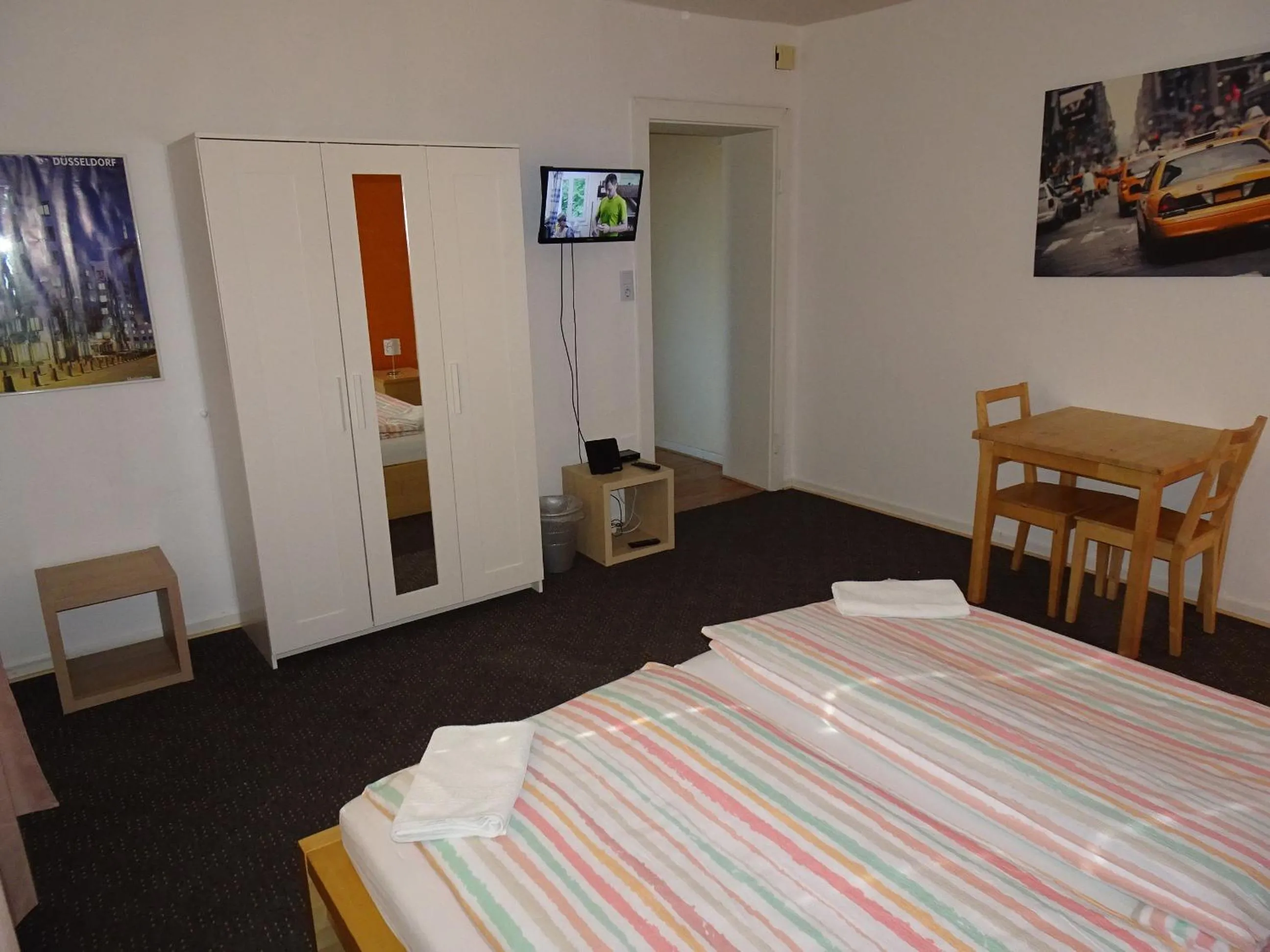 Photo of the whole room, Bed in Gästehaus Grupello