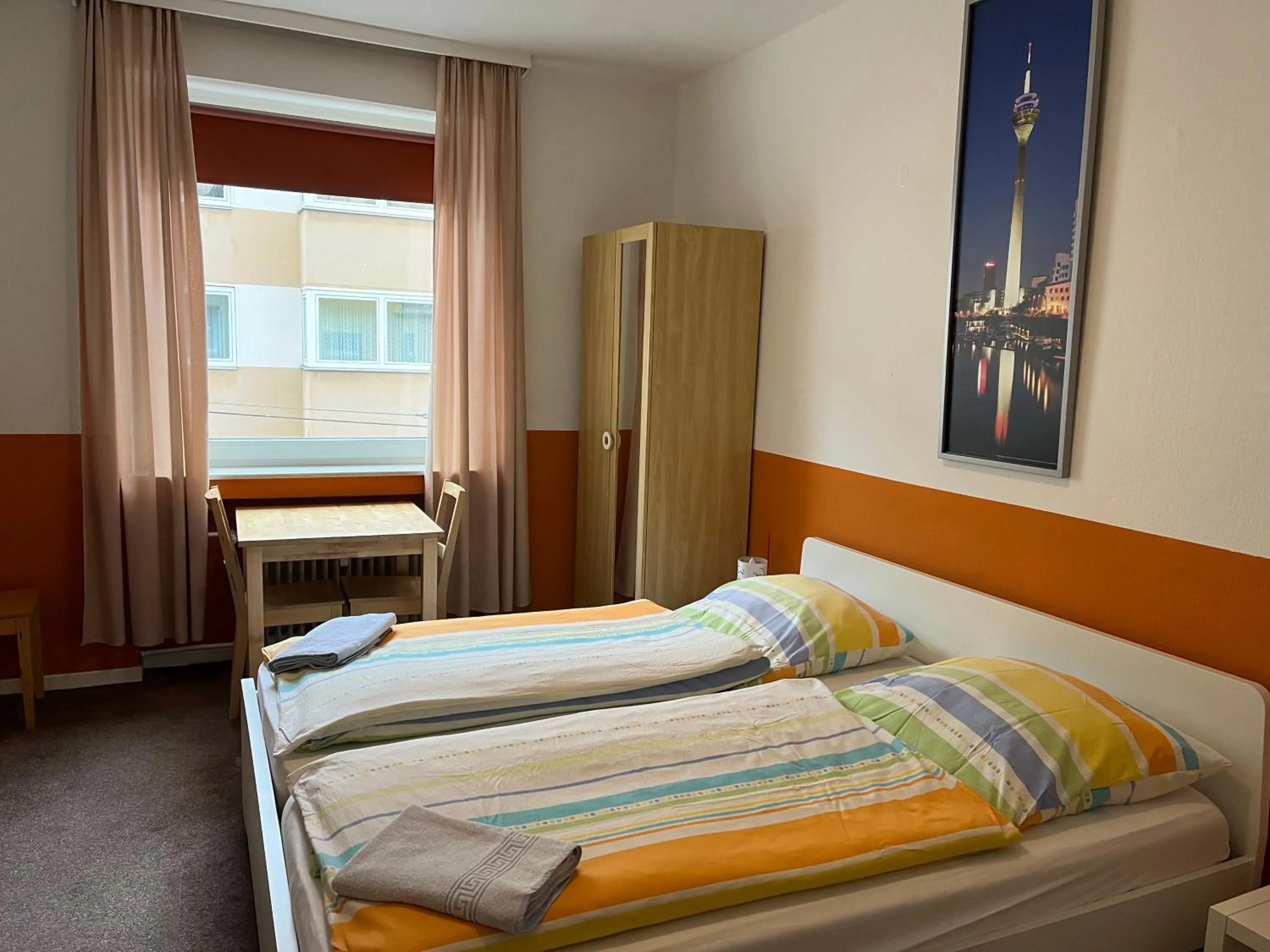 Photo of the whole room, Bed in Gästehaus Grupello