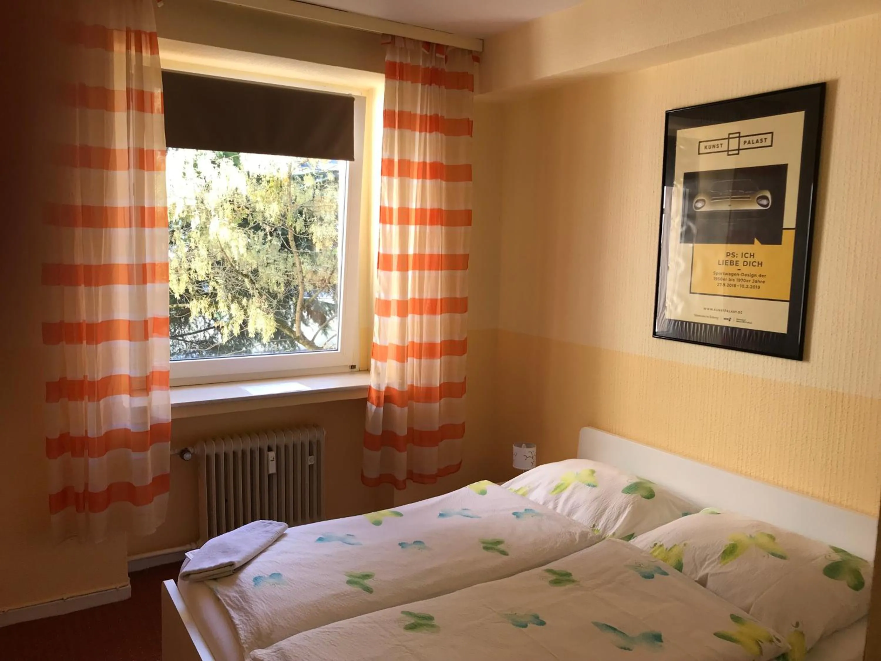 Photo of the whole room, Bed in Gästehaus Grupello