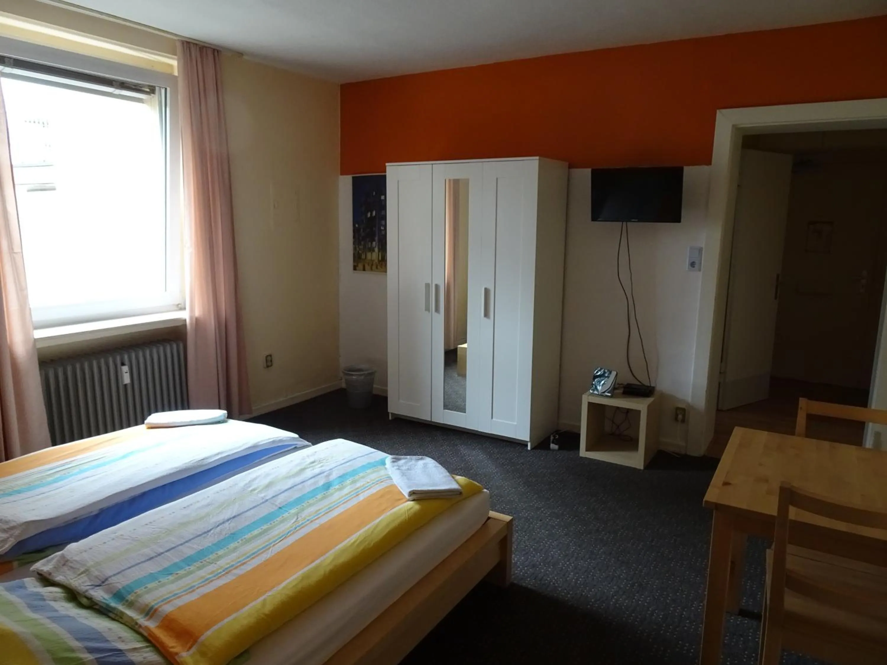 Photo of the whole room, Bed in Gästehaus Grupello