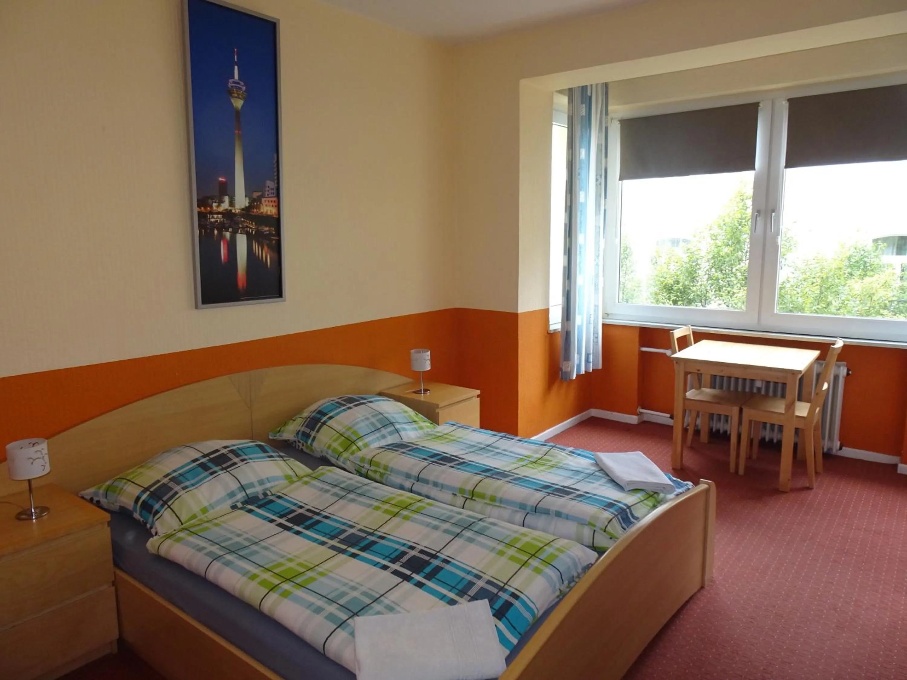 Photo of the whole room, Bed in Gästehaus Grupello