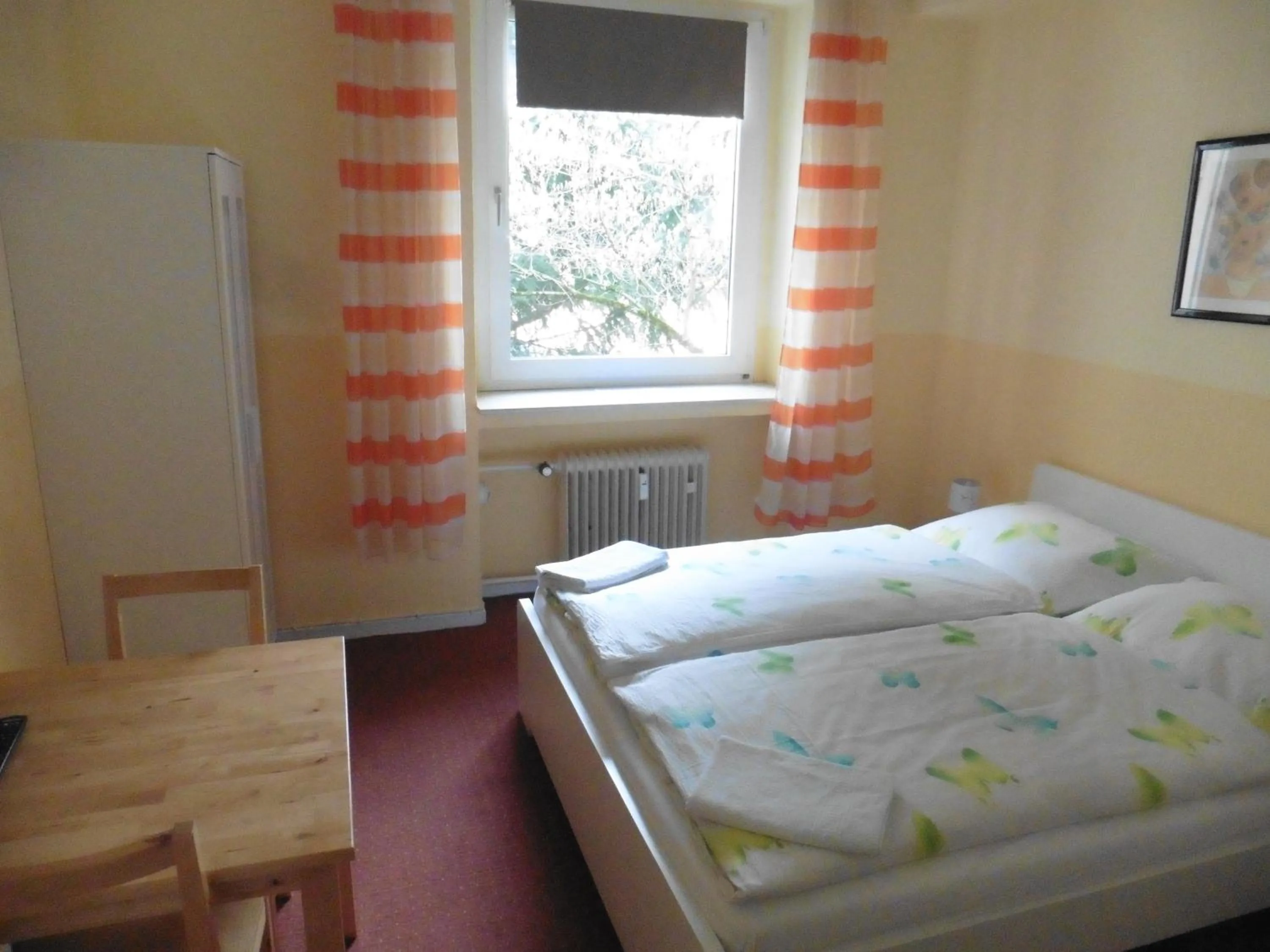 Photo of the whole room, Bed in Gästehaus Grupello