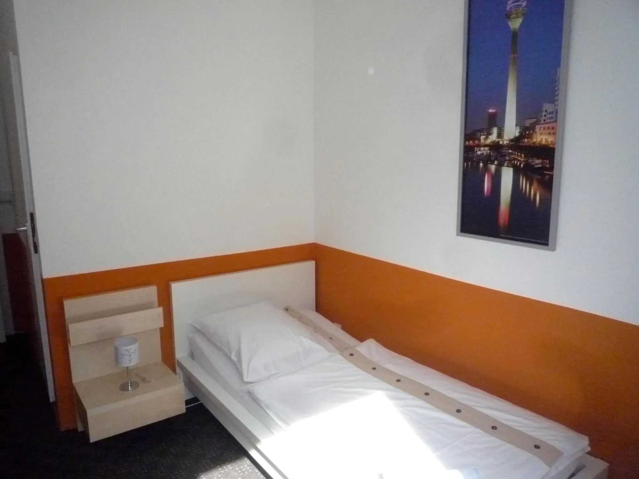 Photo of the whole room, Bed in Gästehaus Grupello